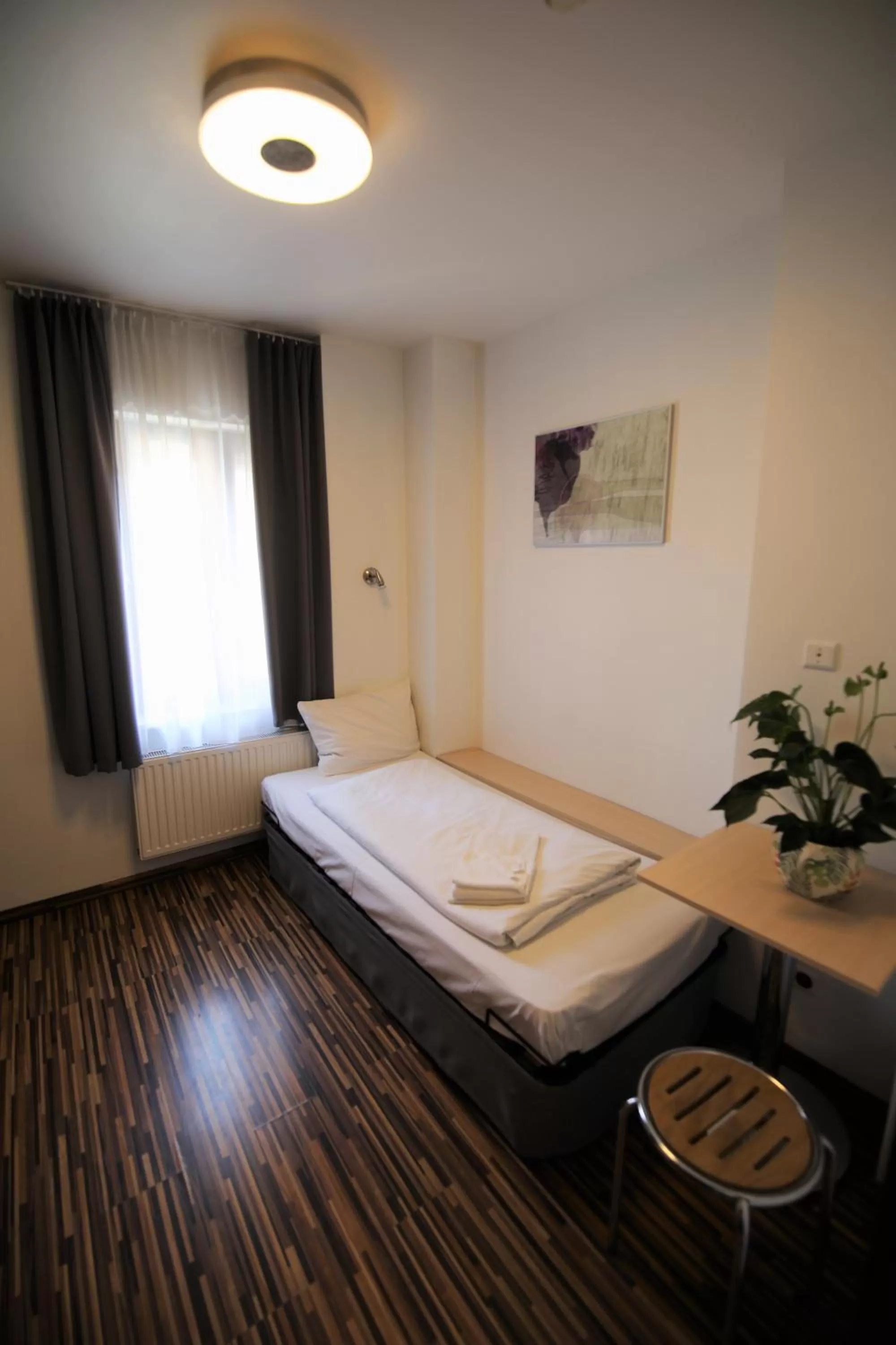 Photo of the whole room, Bed in Akira Bed & Breakfast