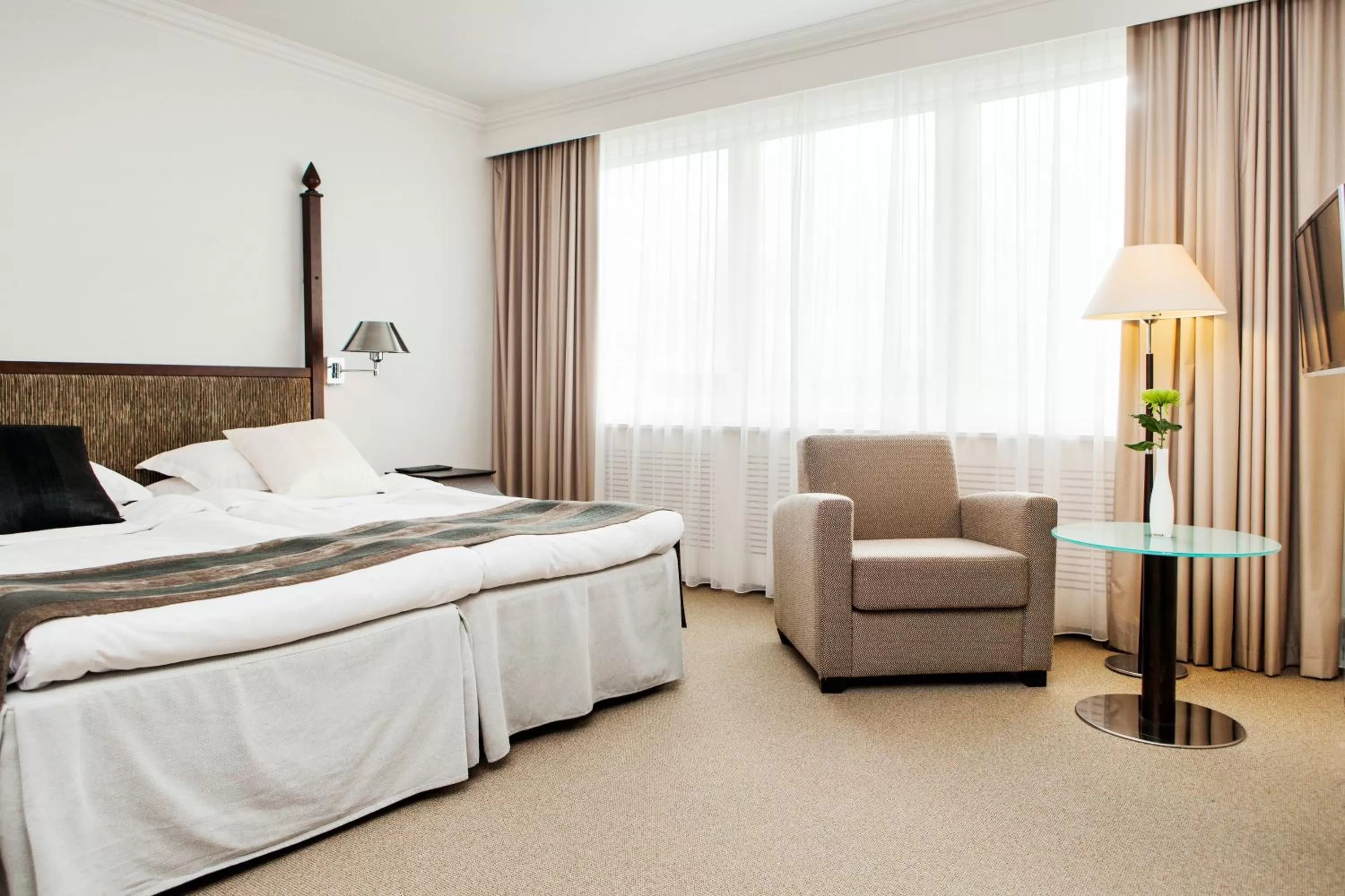 Bed in Elite Park Avenue Hotel