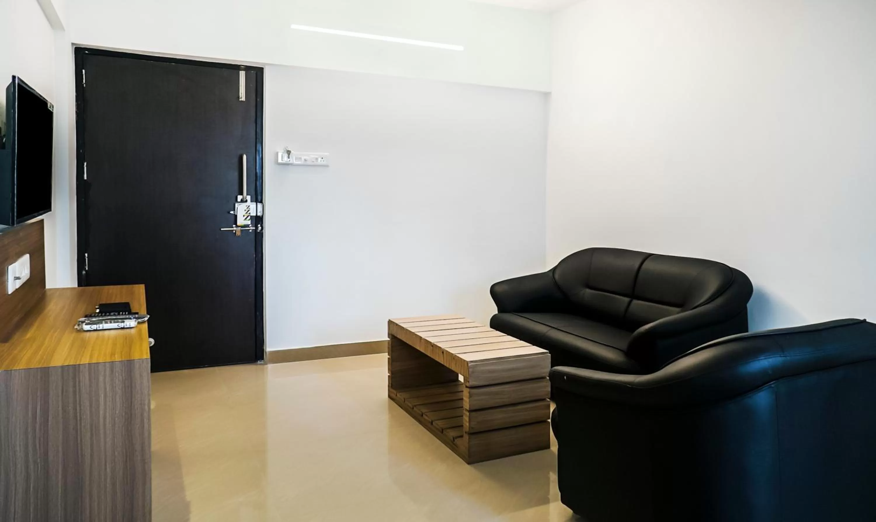Seating area in Treebo Luxe Suite, Shivaji Nagar