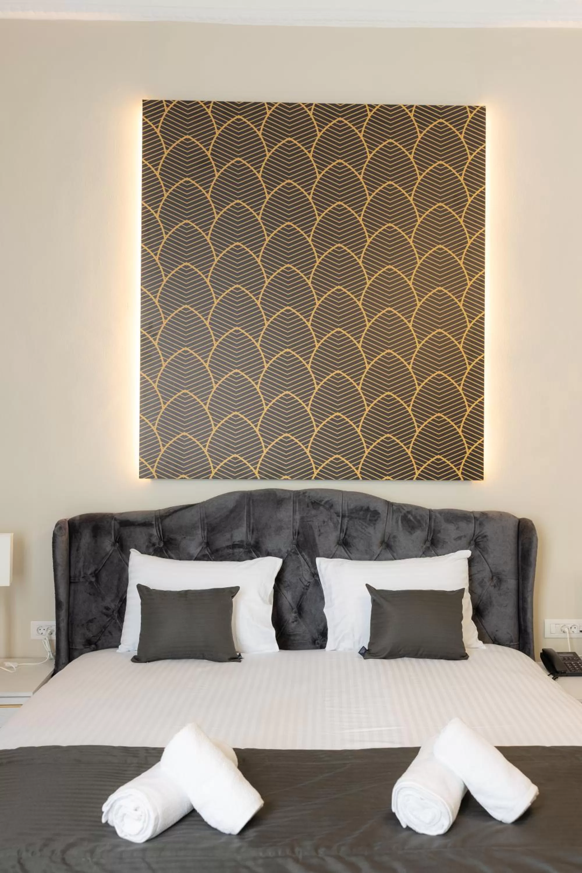 Bed in Modern Revival Luxury Hotel