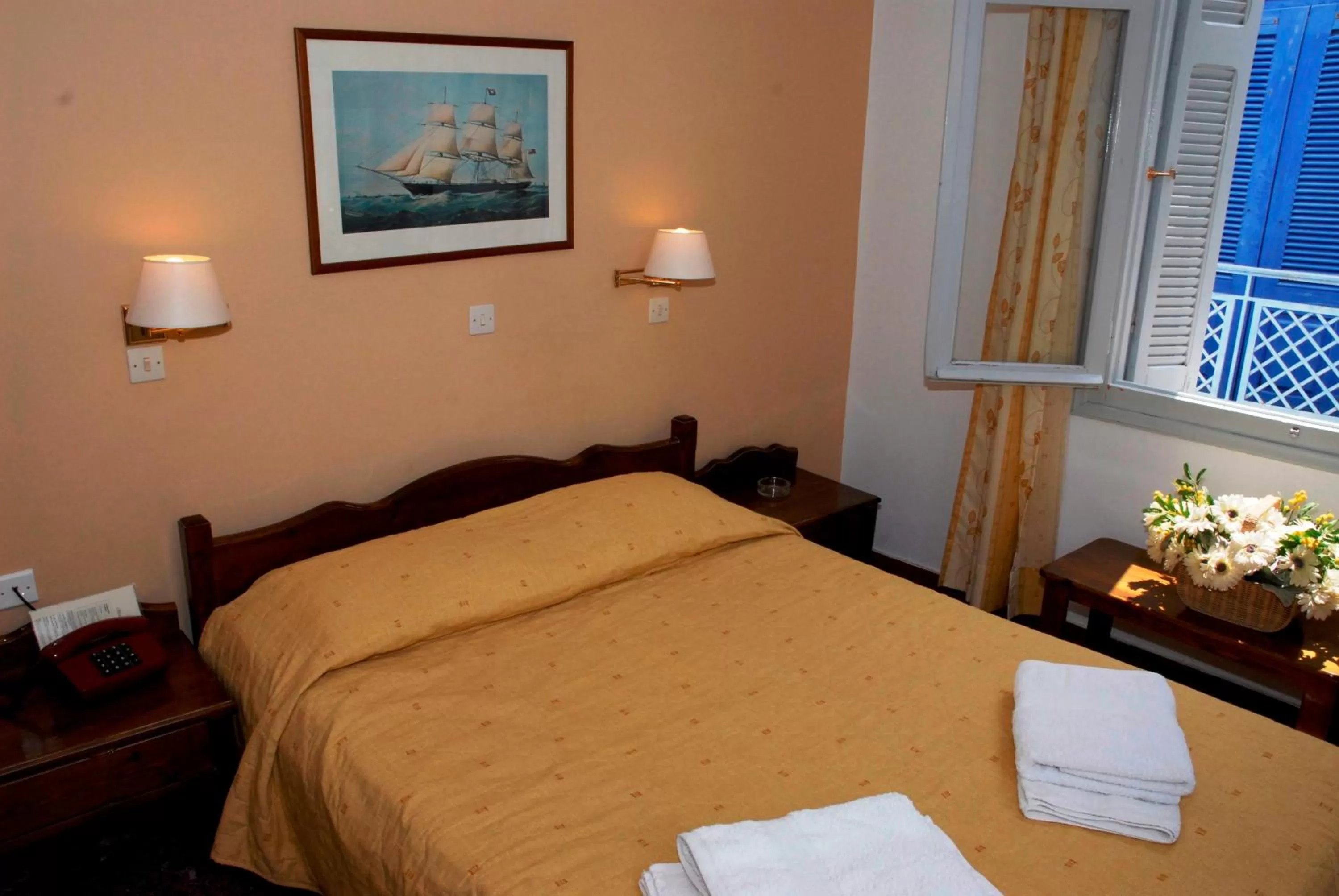 Bed in Amaryllis Hotel