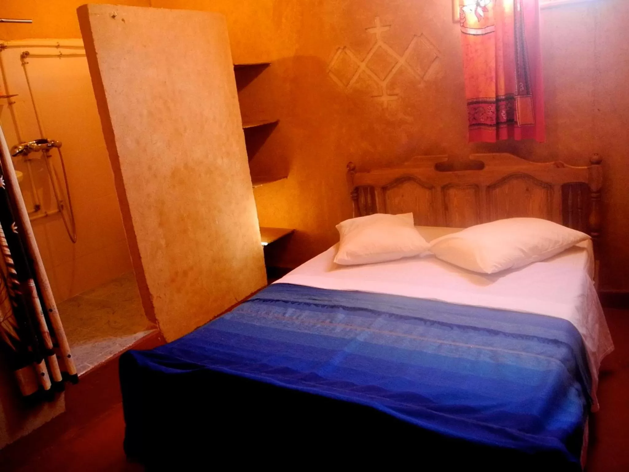 Bed in Maison d'Hôte Valentine