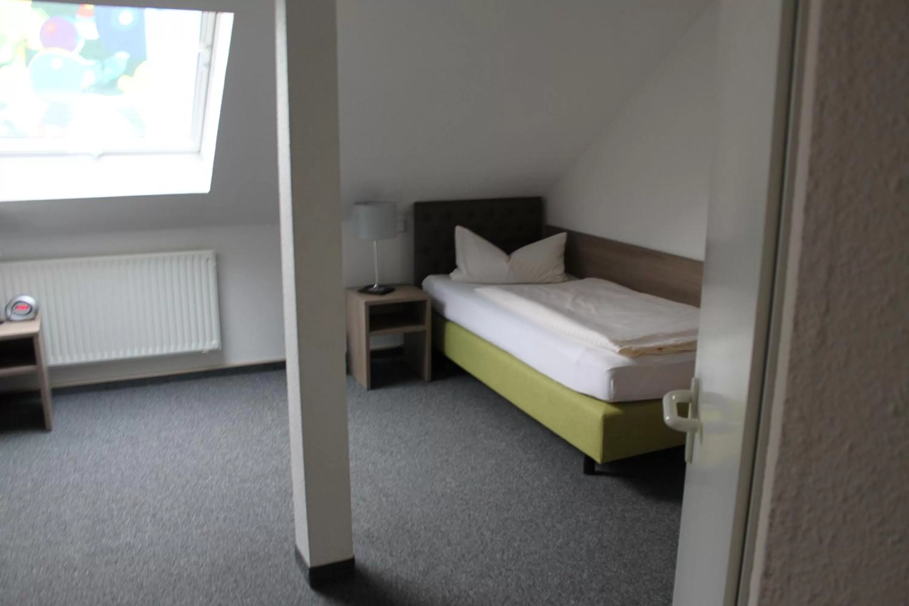 Bed in Hotel Sächsischer Hof