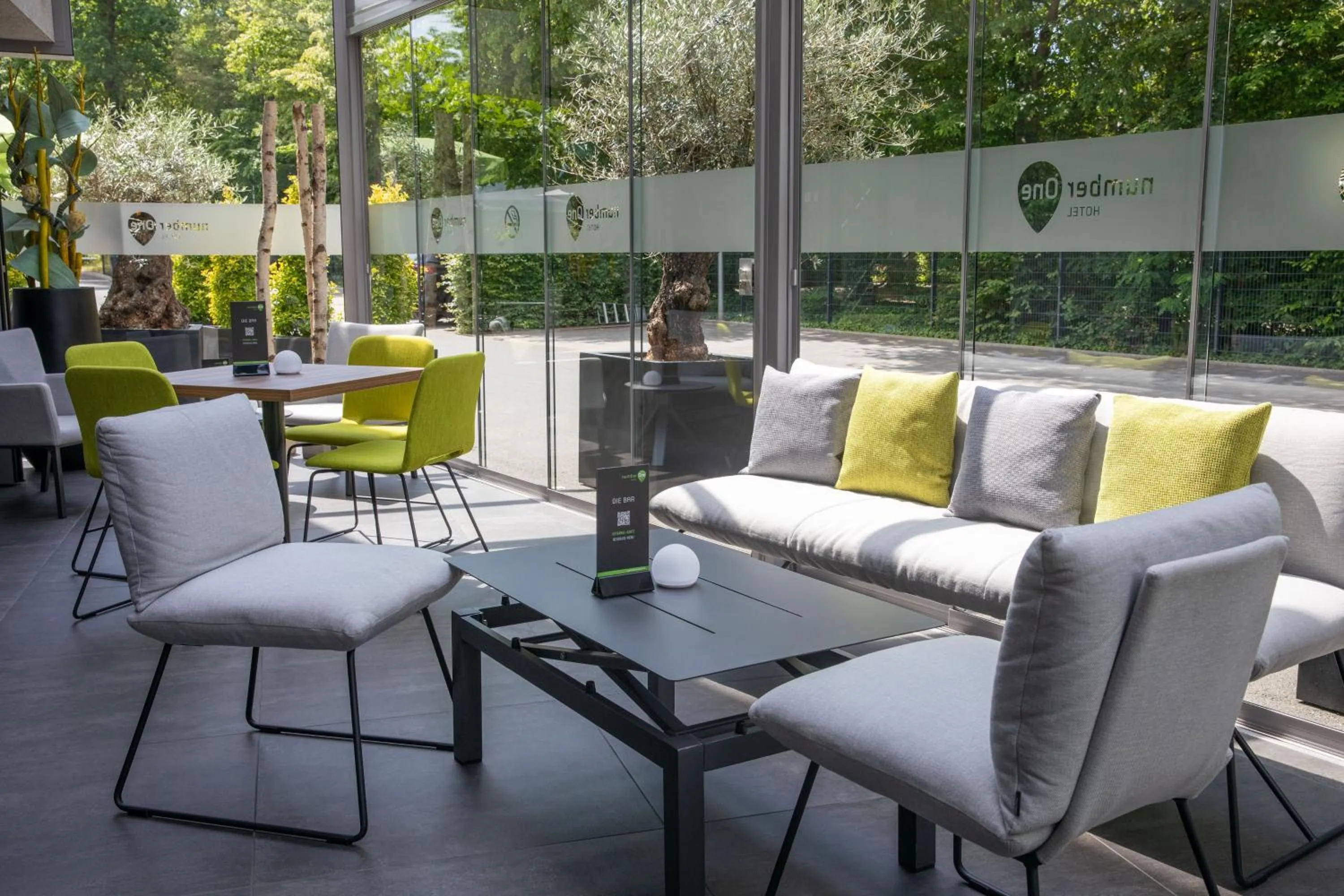 Communal lounge/ TV room in numberOne Hotel