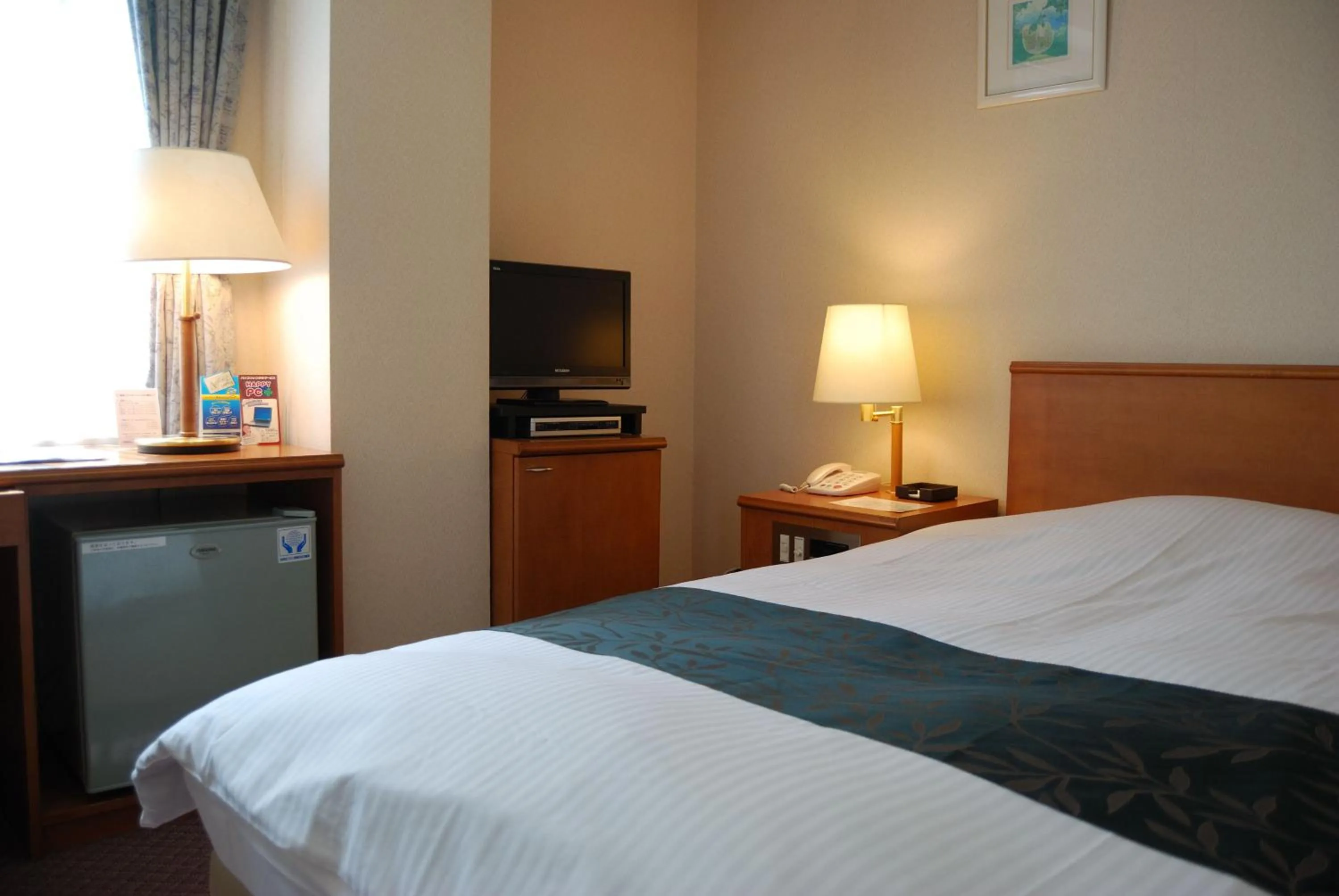 Photo of the whole room, Bed in Kobe City Gardens Hotel (Formally Hotel Kobe Shishuen)