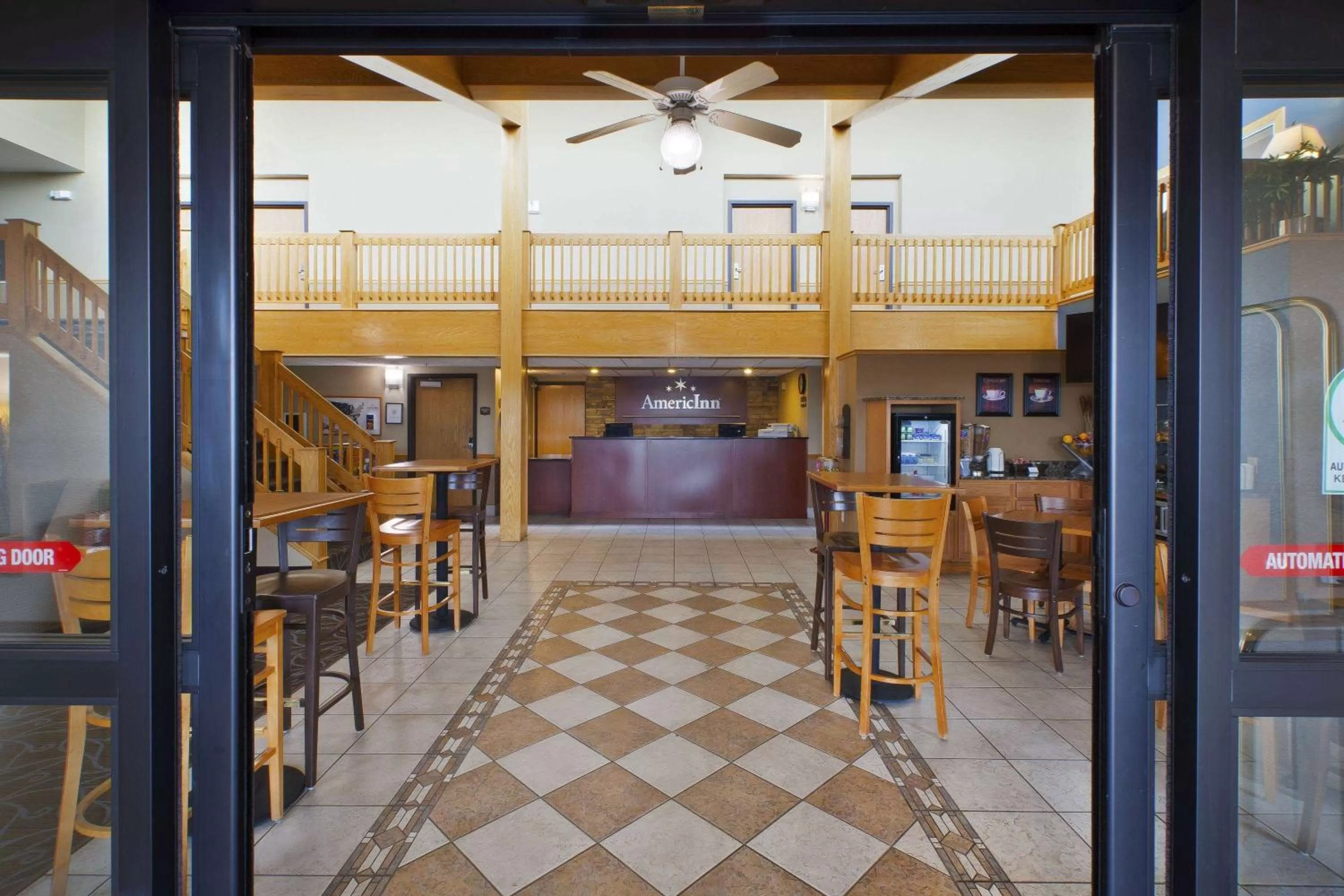 Lobby or reception in AmericInn by Wyndham Bay City