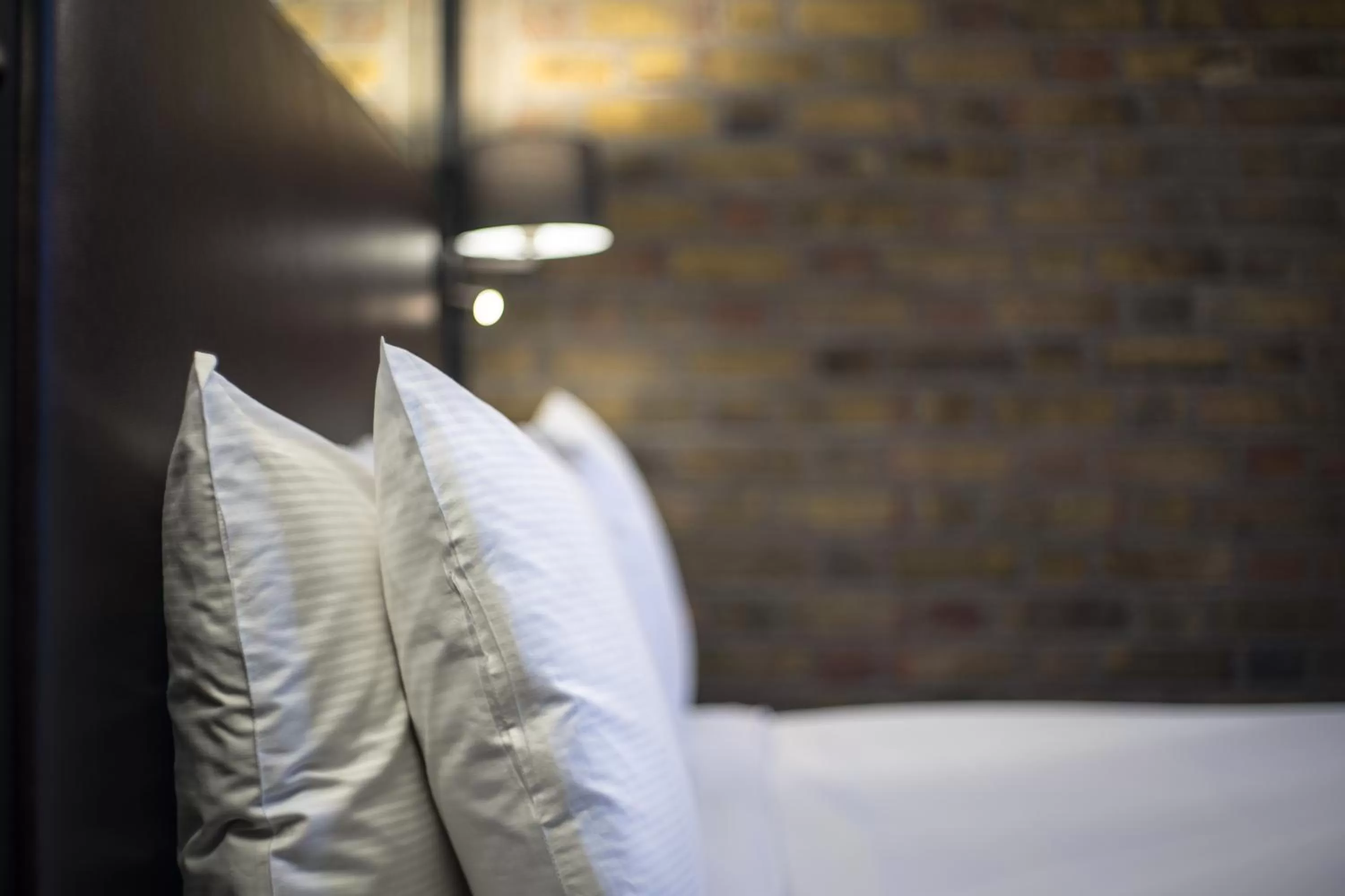 Decorative detail, Bed in Camden Enterprise Hotel