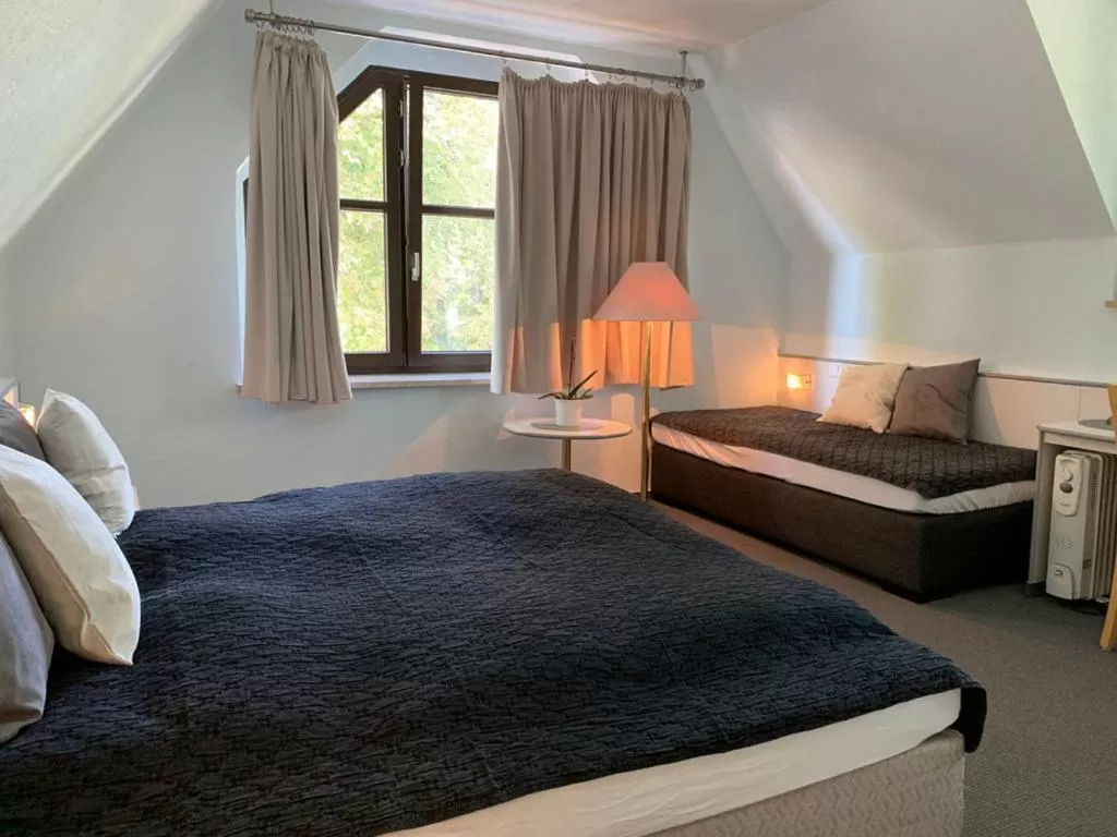 Bed in Hotel Blaufuchs