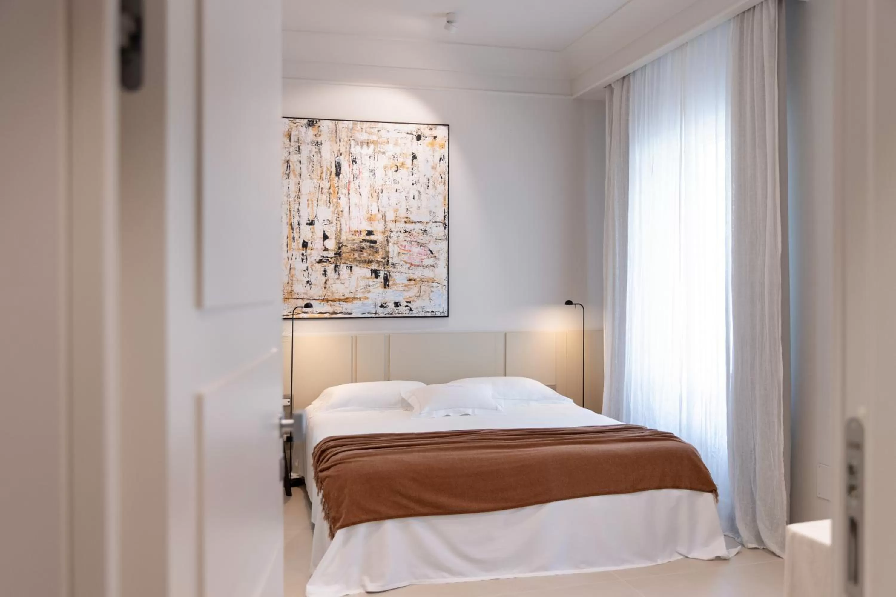 Bed in Taodomus Boutique Hotel