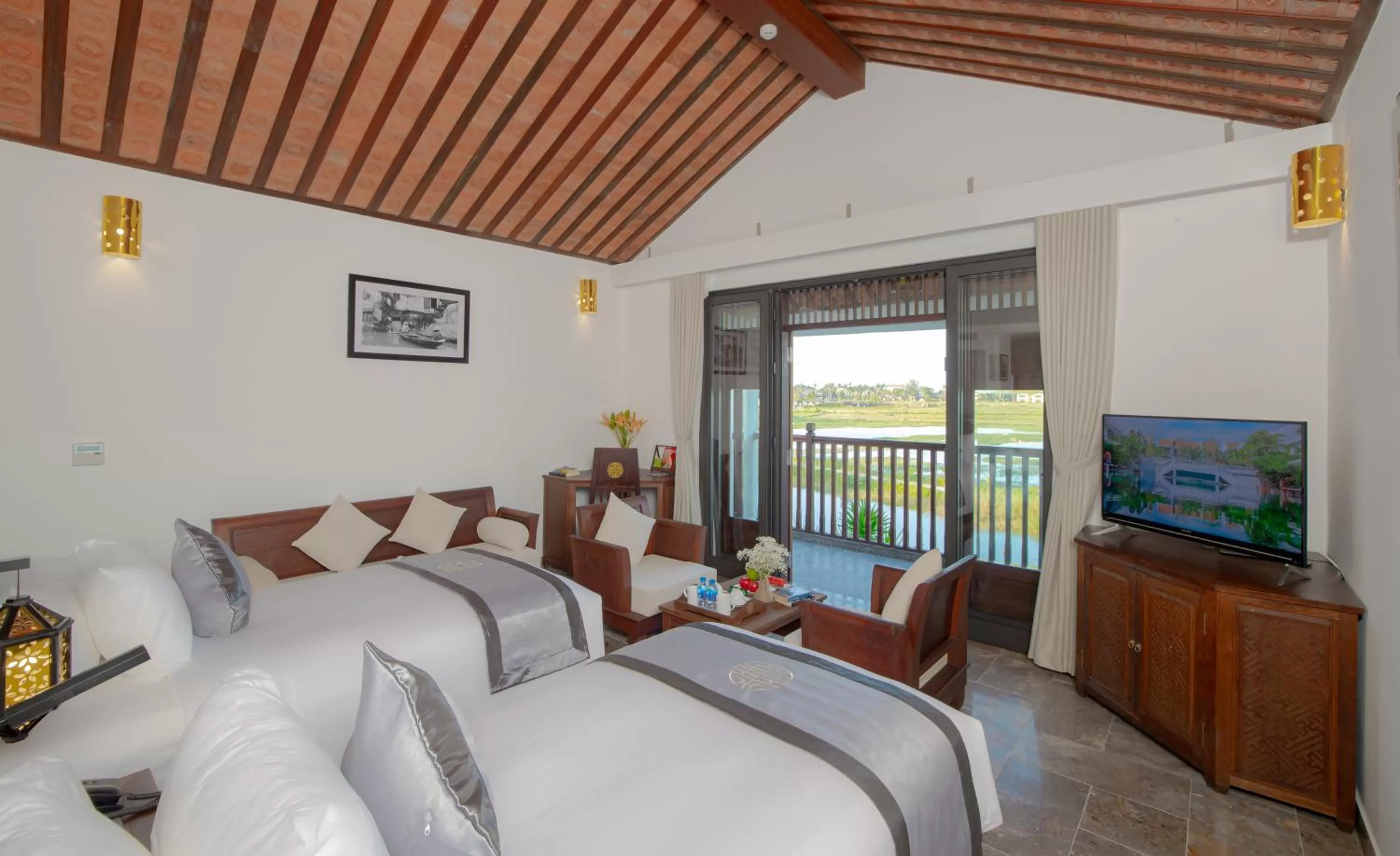 Bedroom in Legacy Hoi An Resort - formerly Ancient House Village Resort & Spa