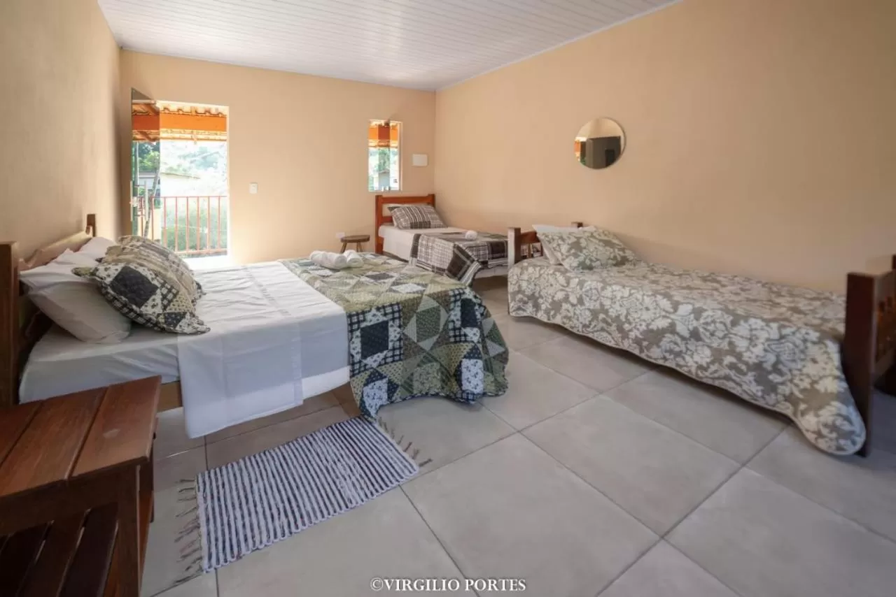 Bed in Pousada Recanto da Lu
