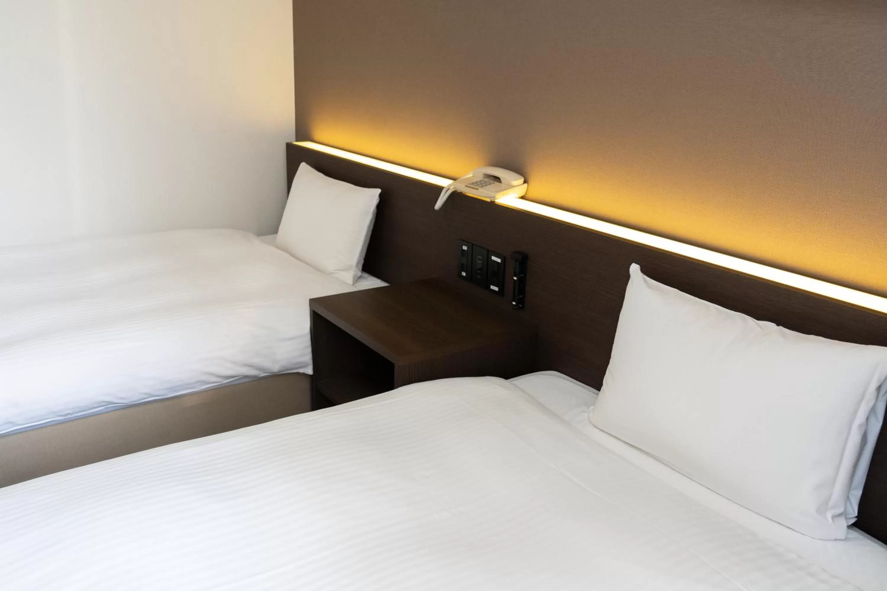 Photo of the whole room, Bed in Heiwadai Hotel Tenjin