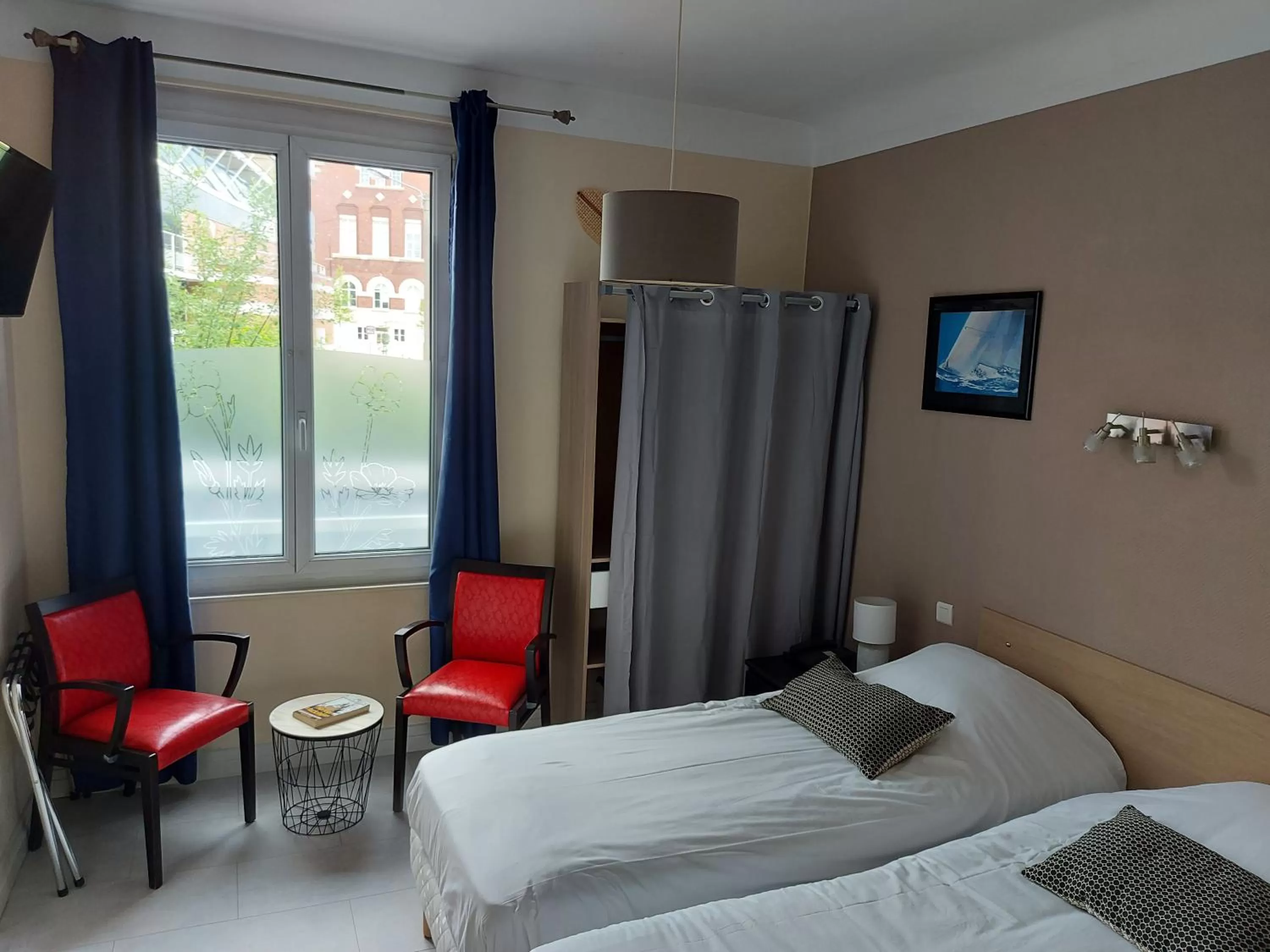 Bed in Hotel De La Paix