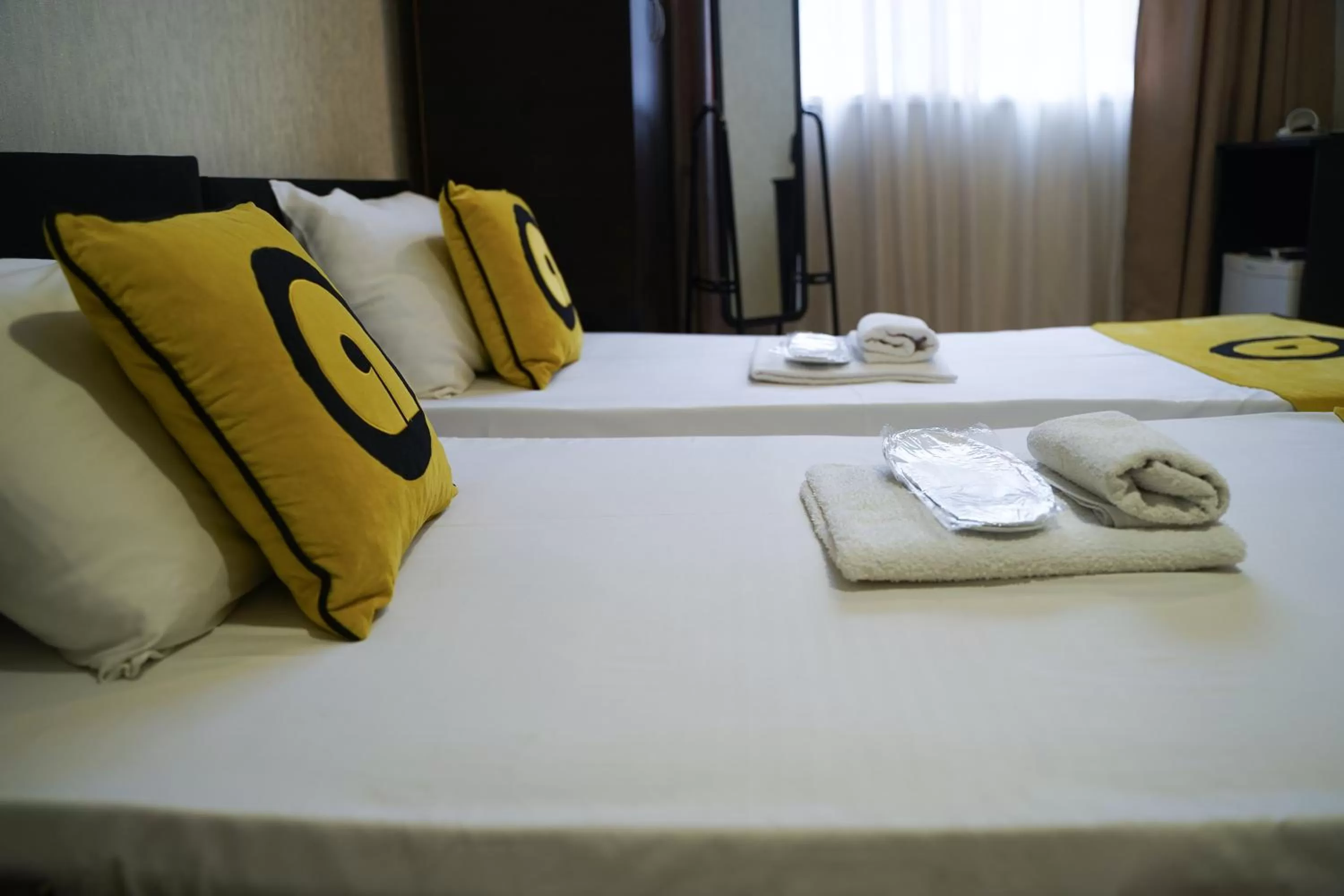 Photo of the whole room, Bed in Aura Plaza Hotel