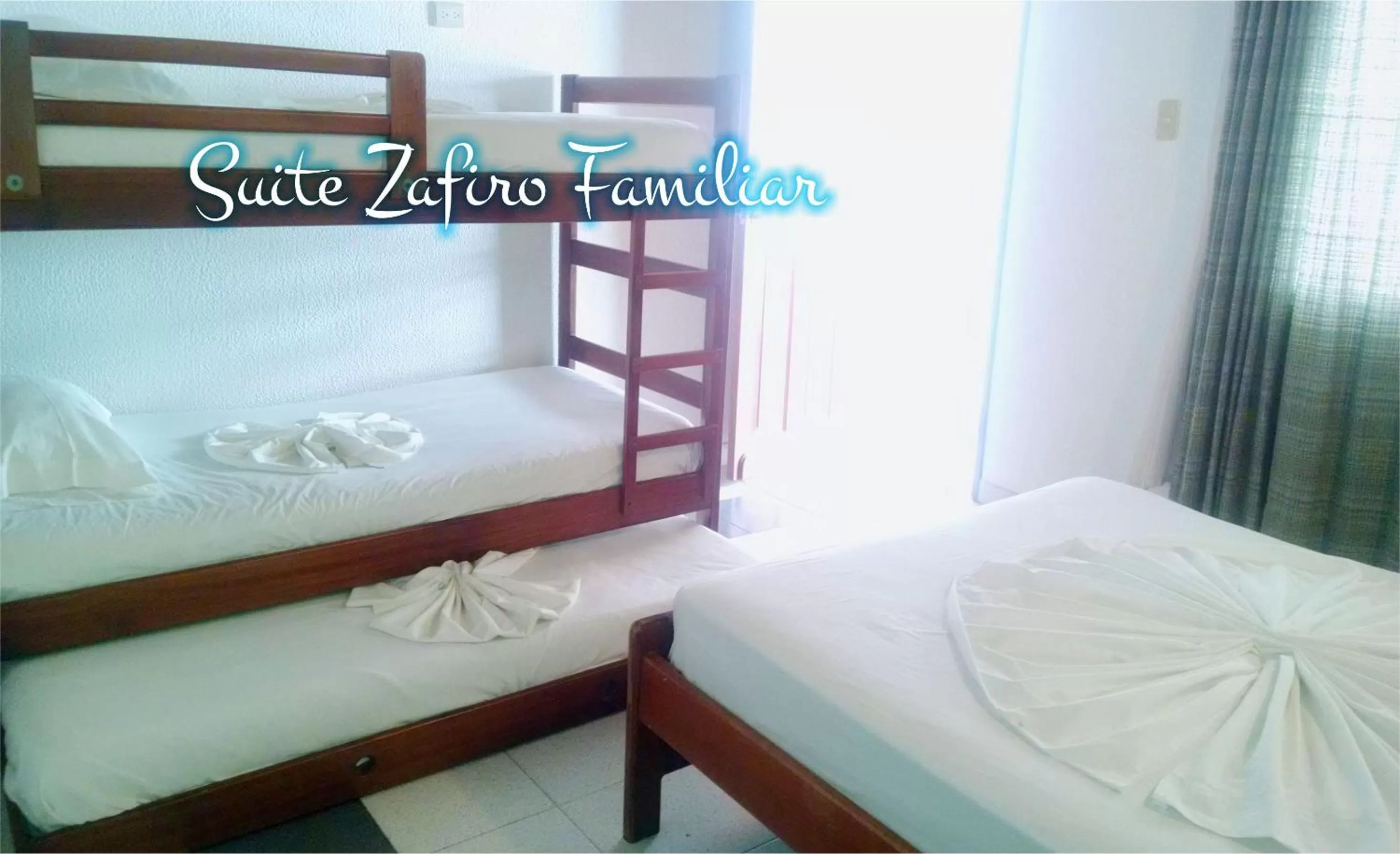 Bed in Suite Sumapaz Hotel