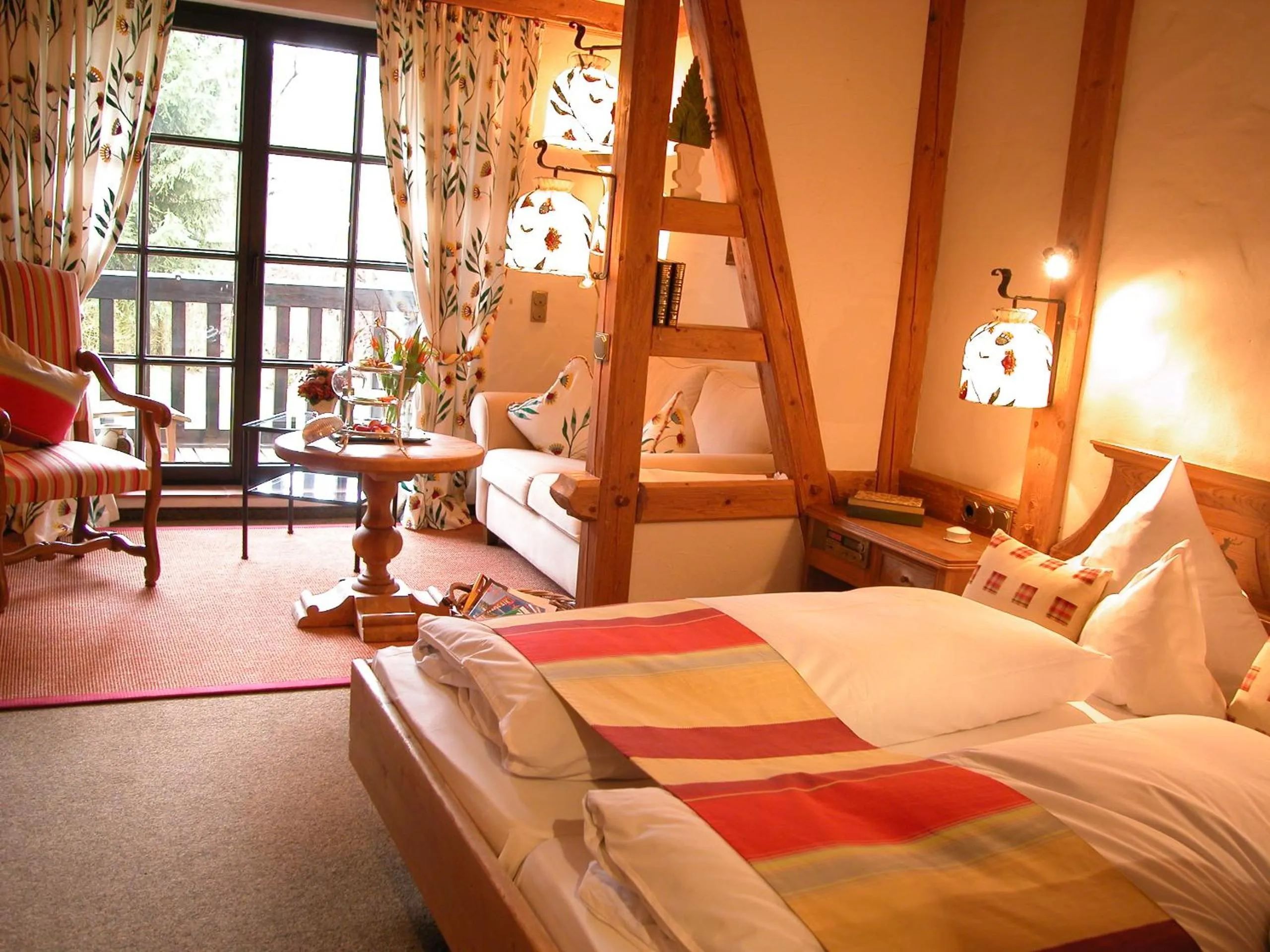 Photo of the whole room, Bed in Relais & Châteaux Jagdhof Glashütte