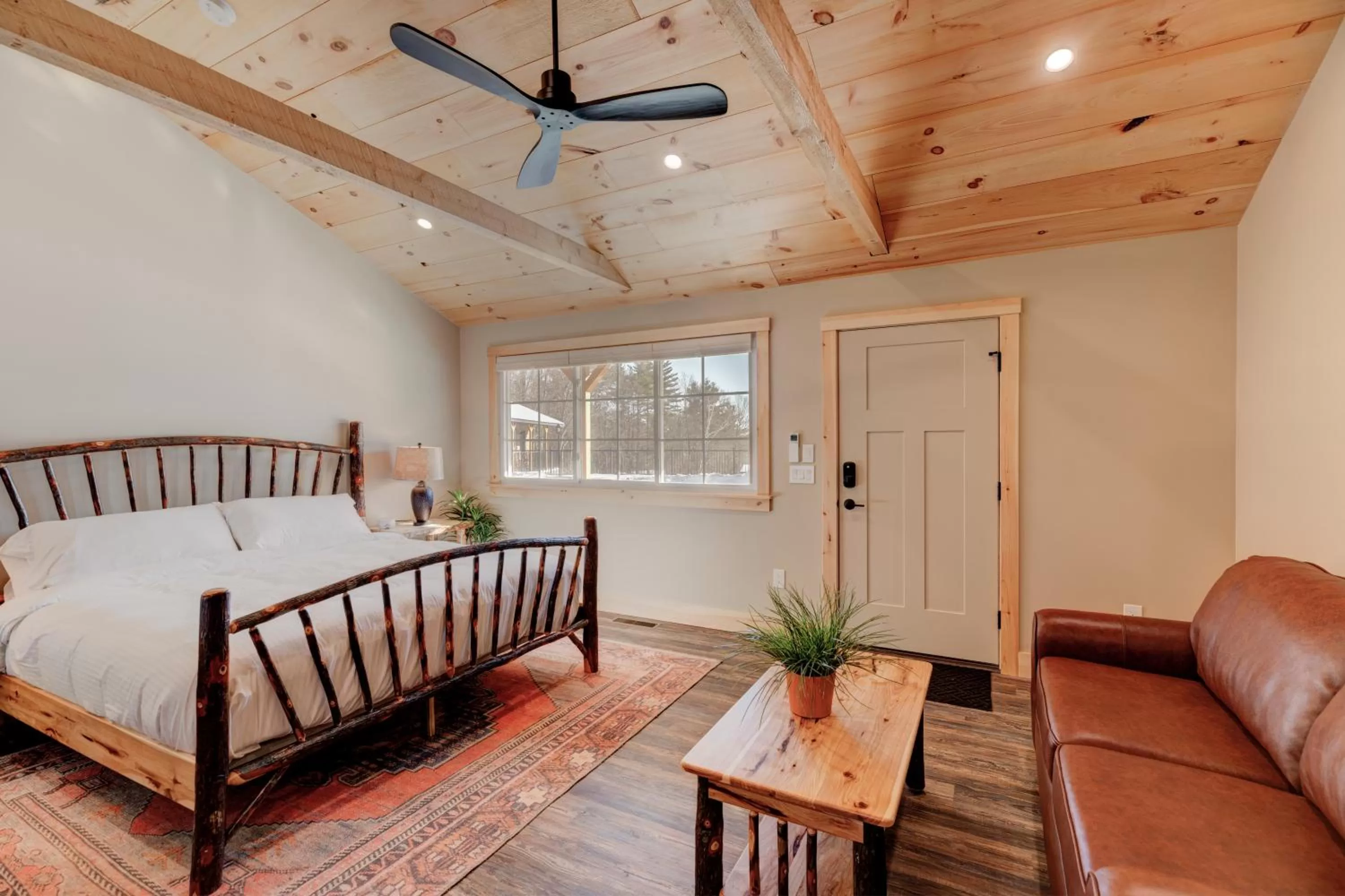 Bed in The Lodge by Sunapee Stays