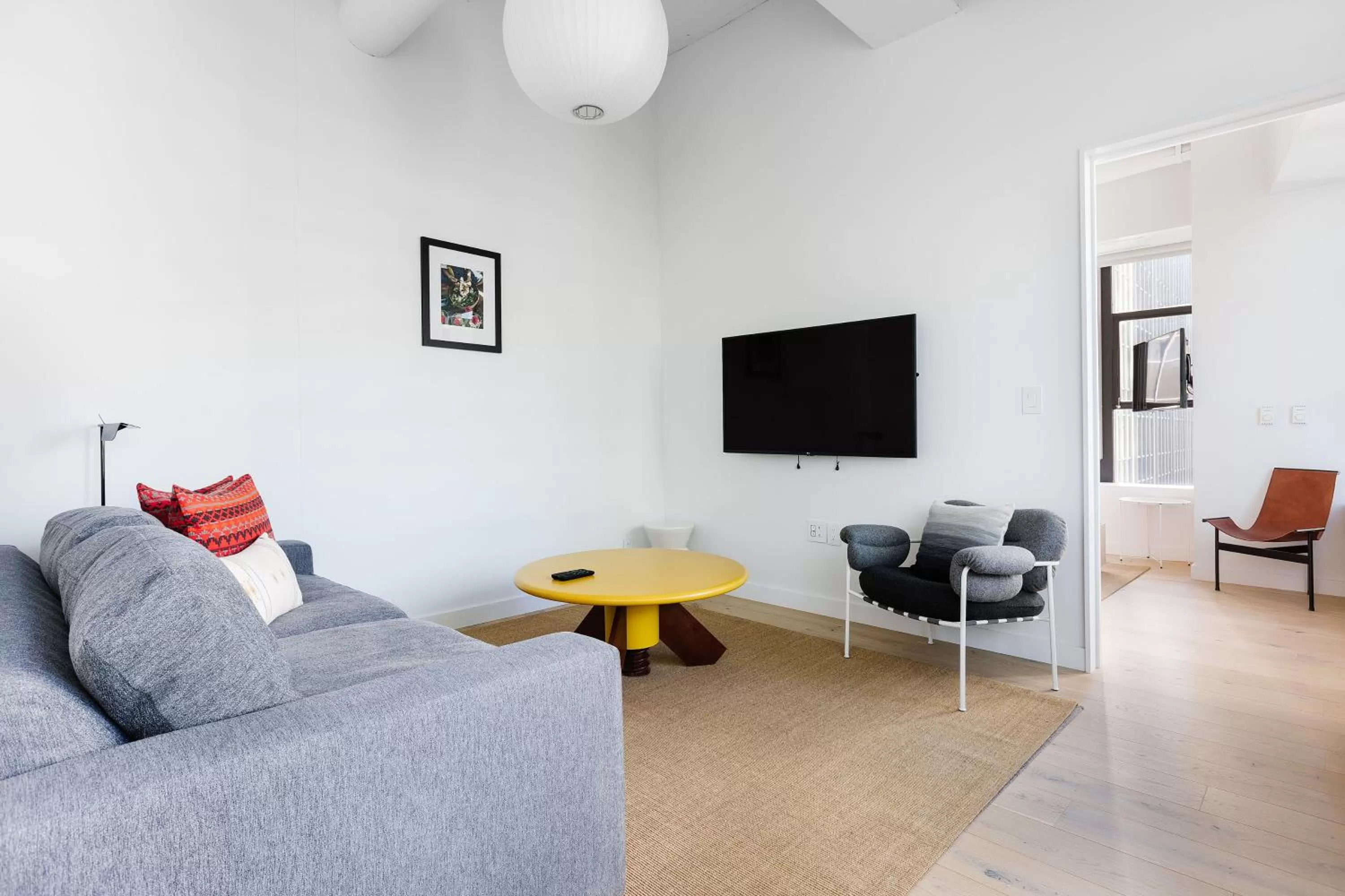 Communal lounge/ TV room in Placemakr Wall Street