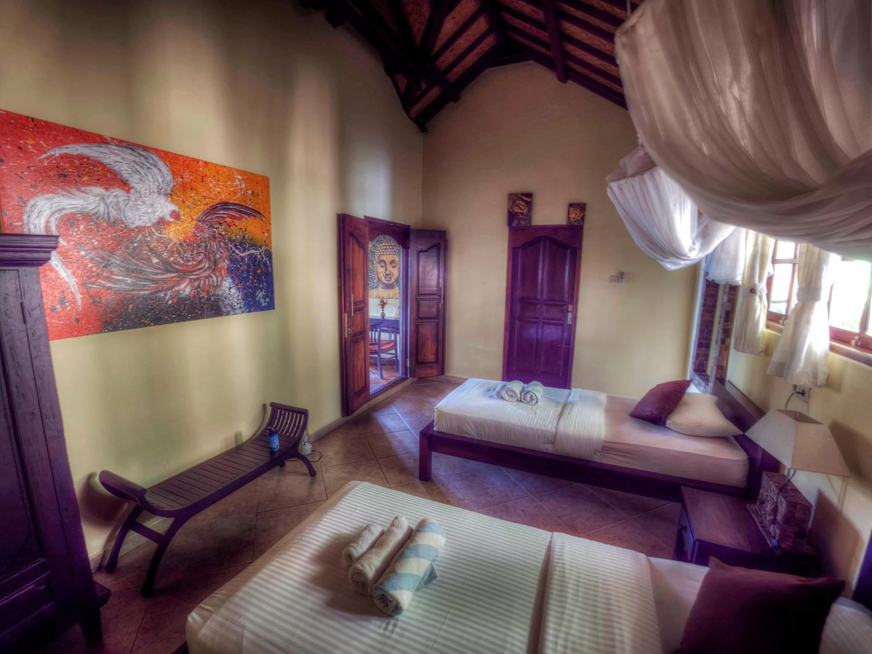 Bed in Puri Mangga Sea View Resort and Spa