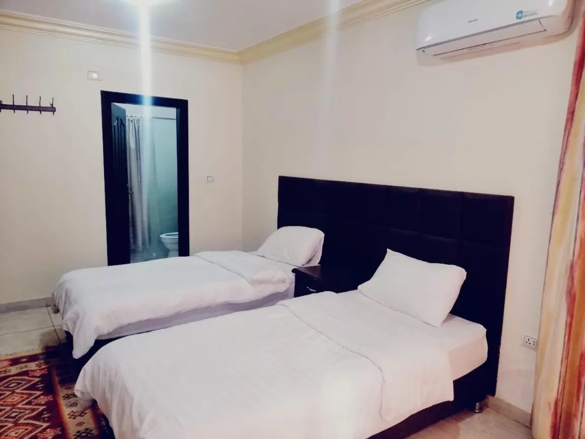 Bed in Al haramain Furnished Apartments