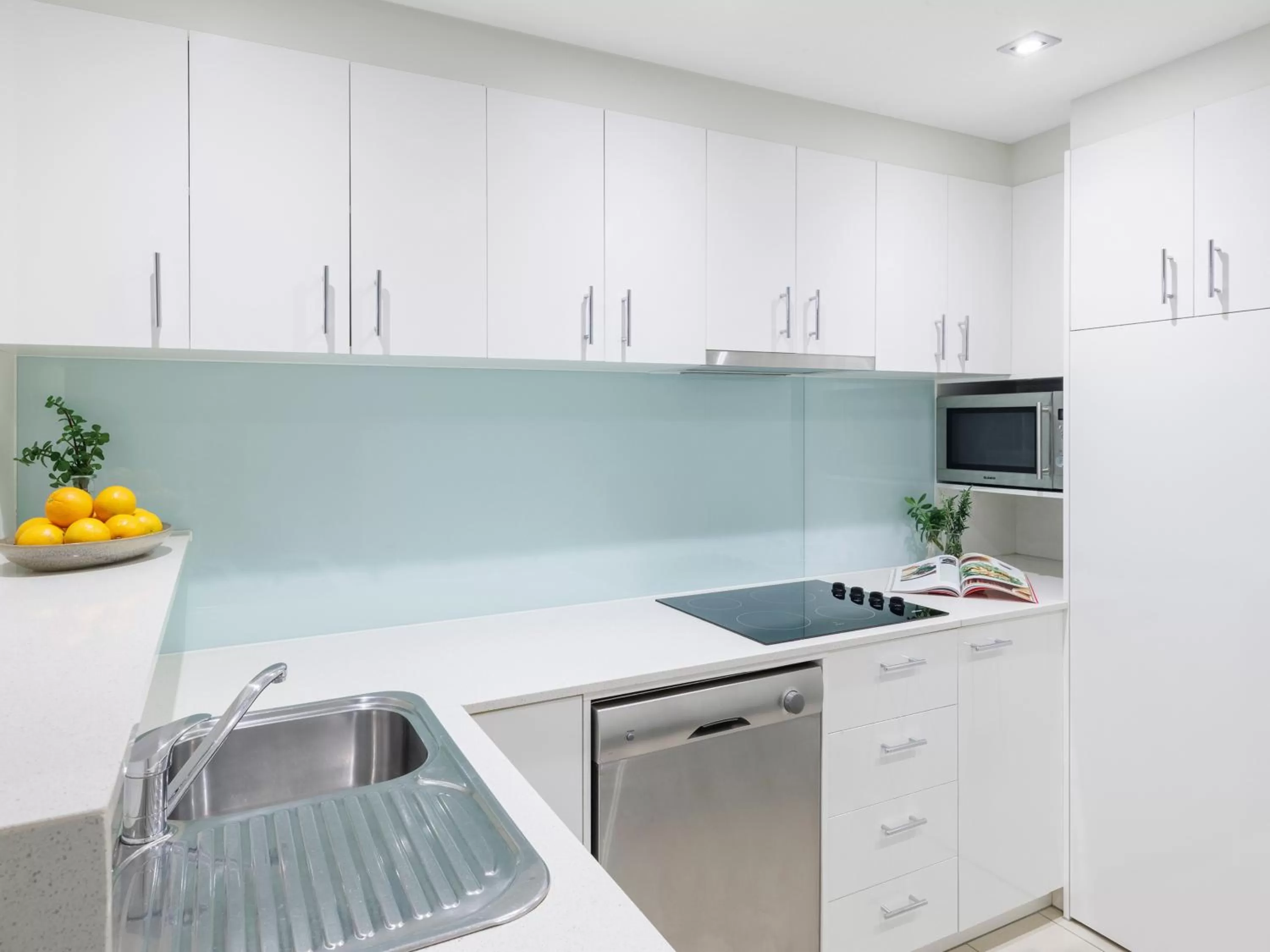 Kitchen or kitchenette in Brady Apartment Hotel Flinders Street