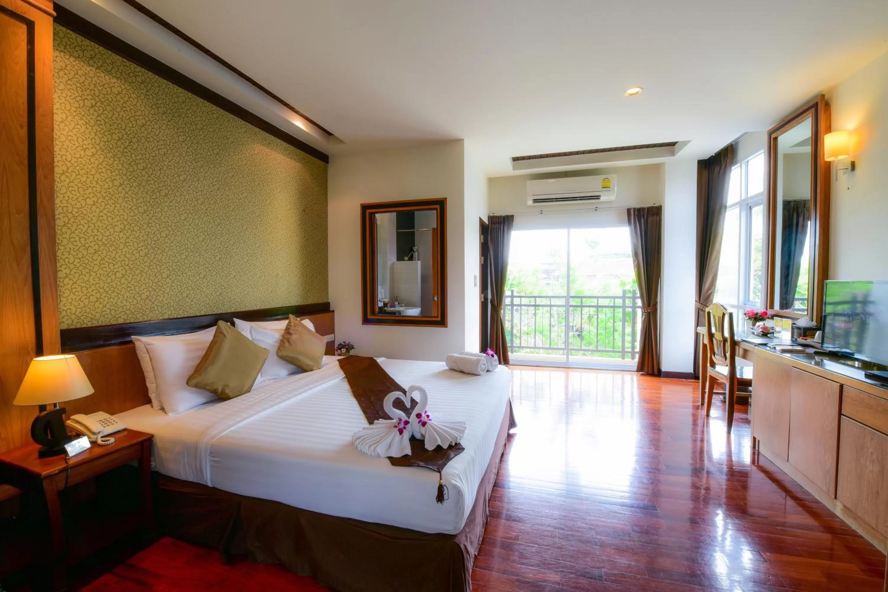 Photo of the whole room, Bed in Rapeepan Ville Hotel