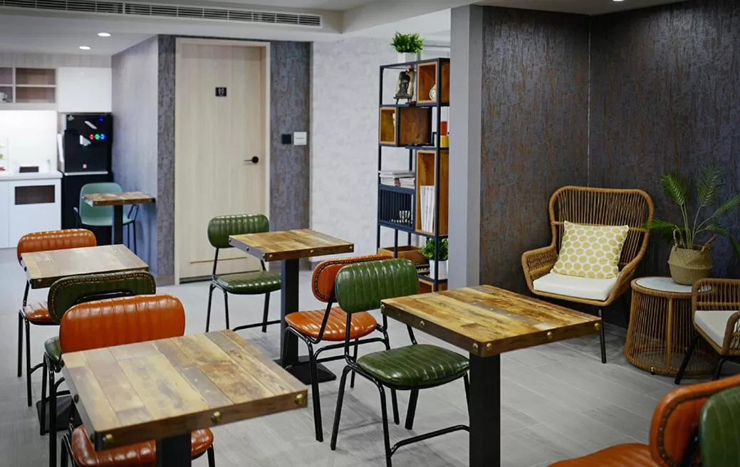 Seating area in Comma Boutique Hotel