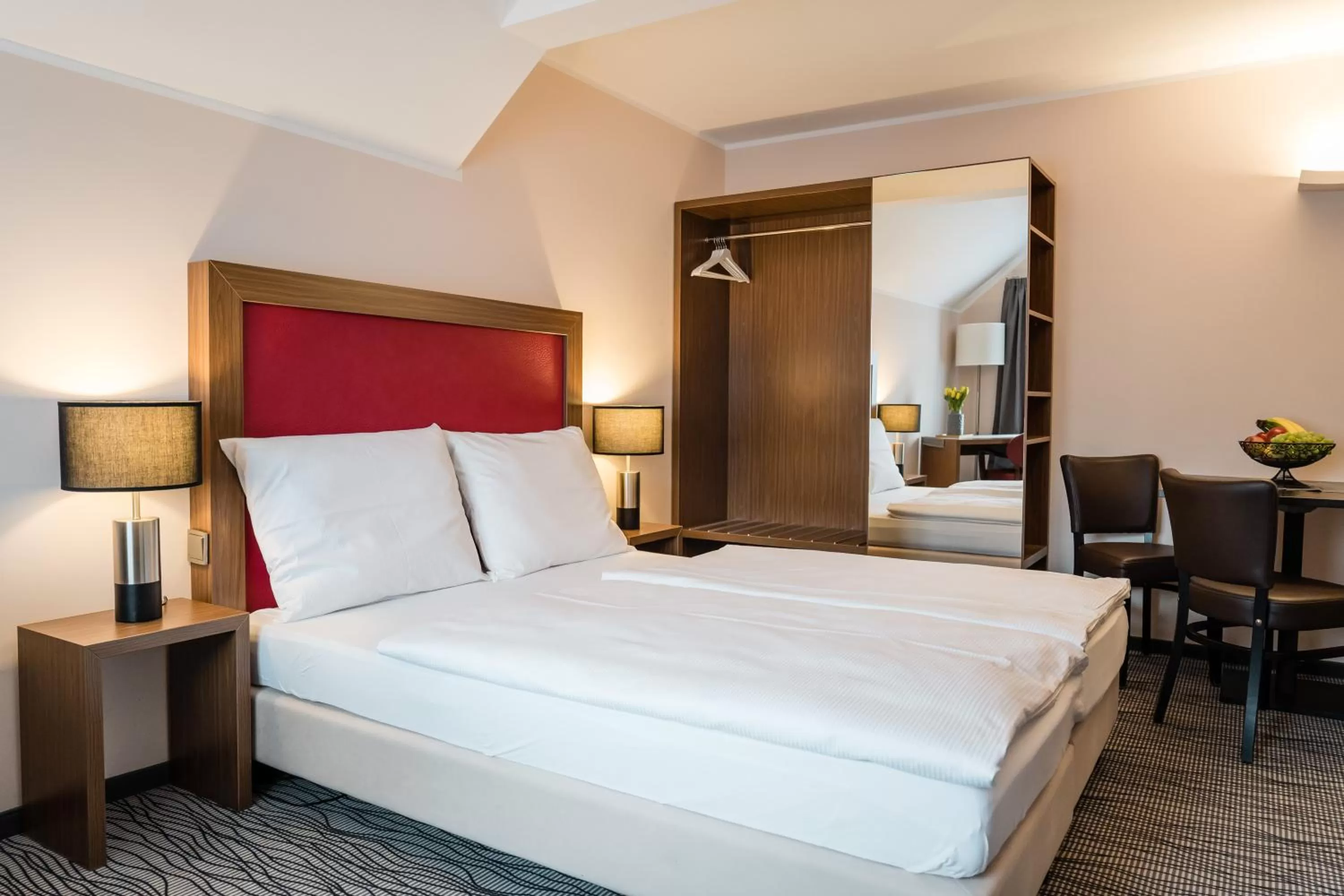 Bed in Point Hotel Apartments and Rooms