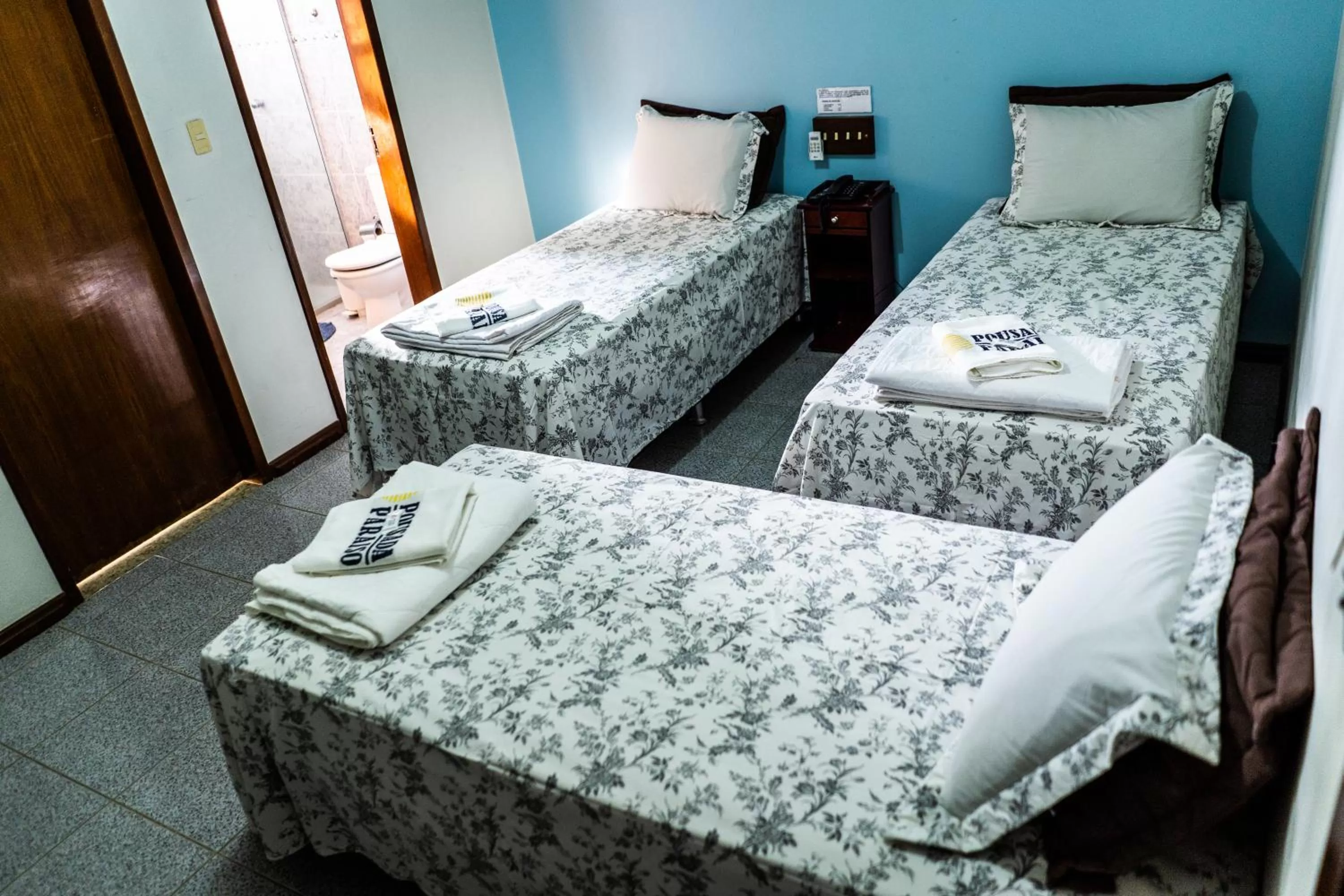 Bed in Pousada Paraiso