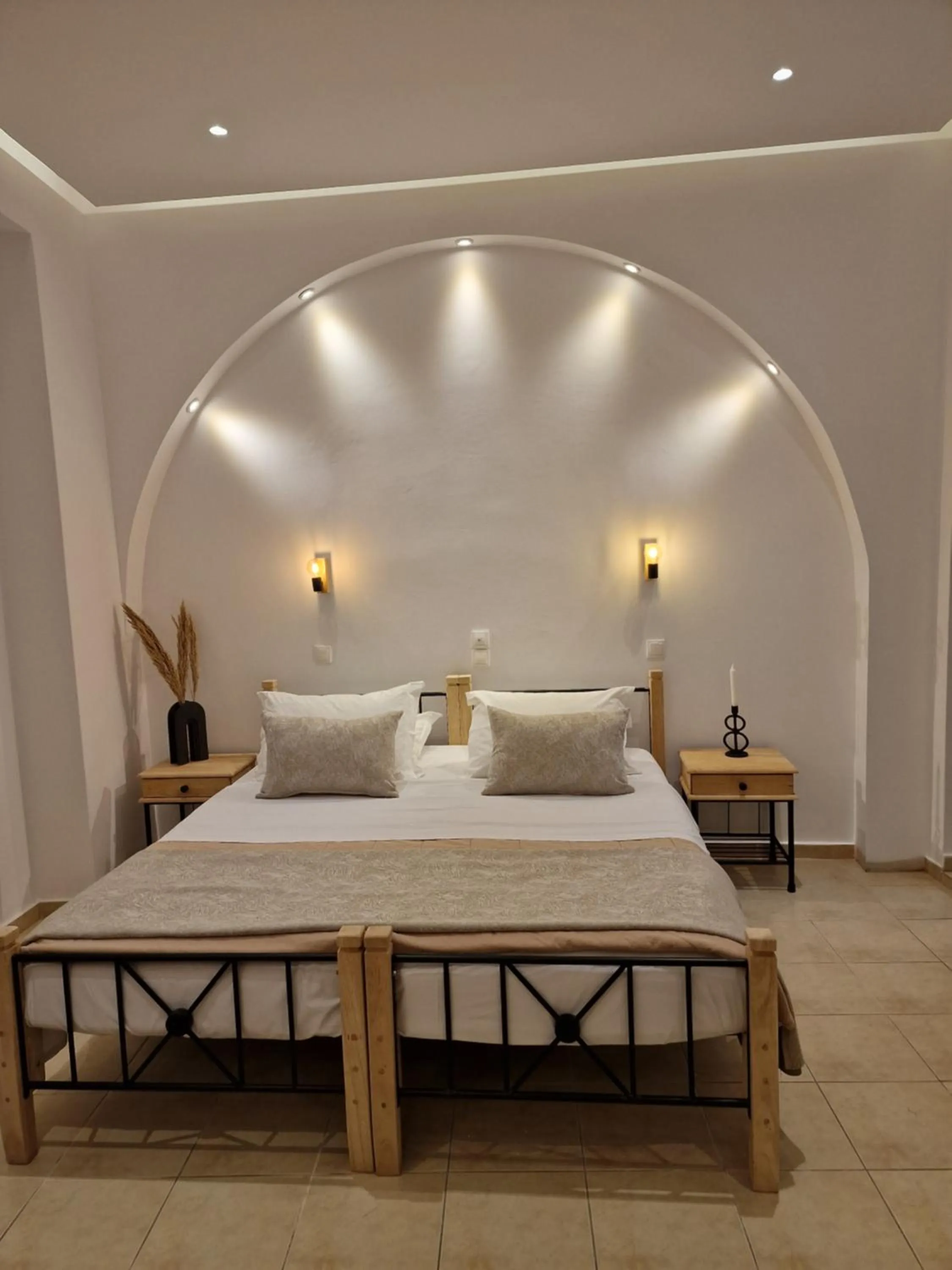 Bed in Amerisa Suites & Villa