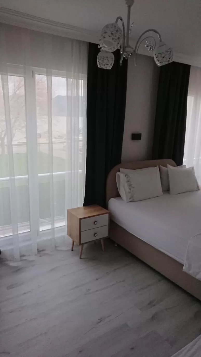 Lake view, Bed in Ali's Pension ada alis