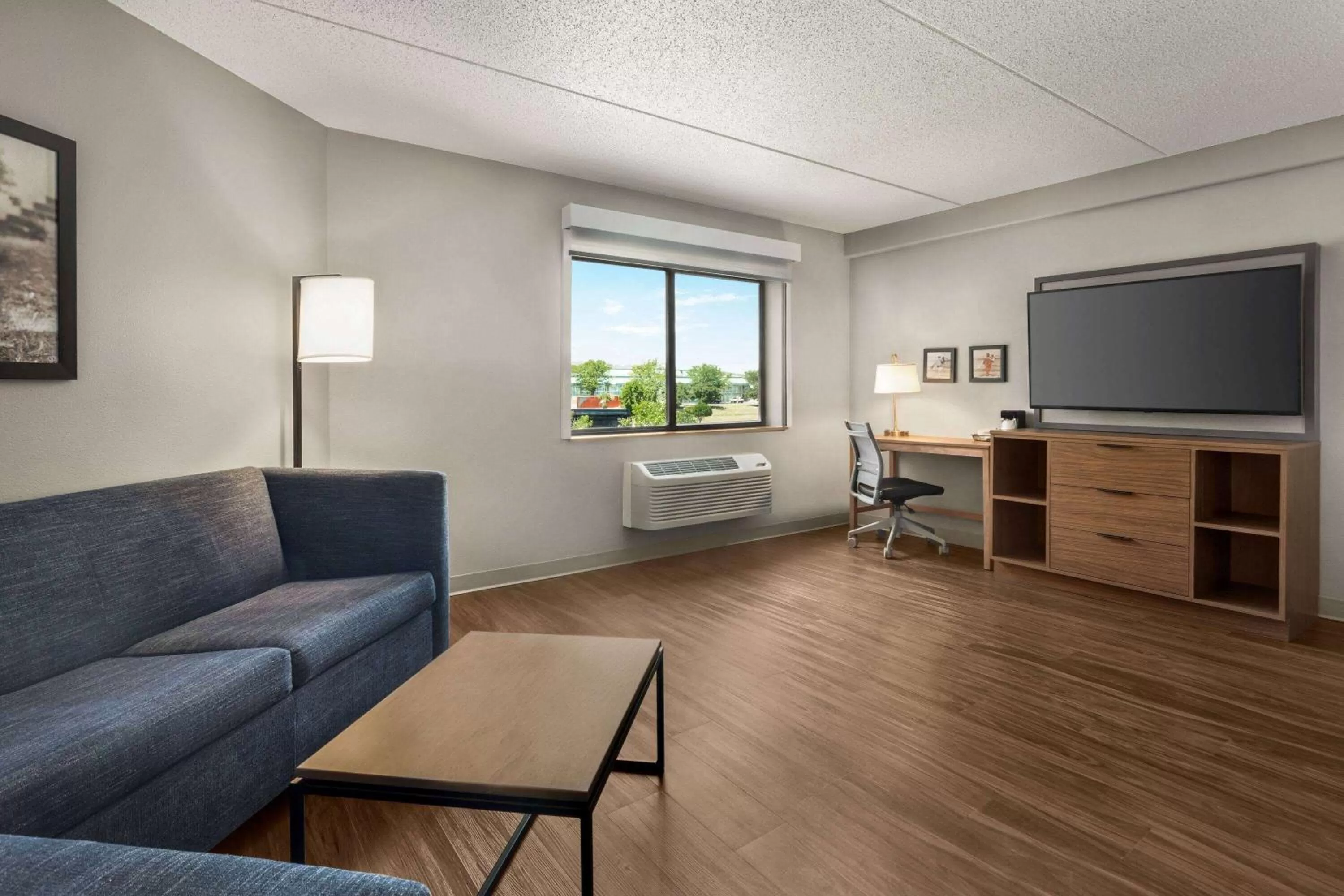 Bed in AmericInn by Wyndham Rapid City