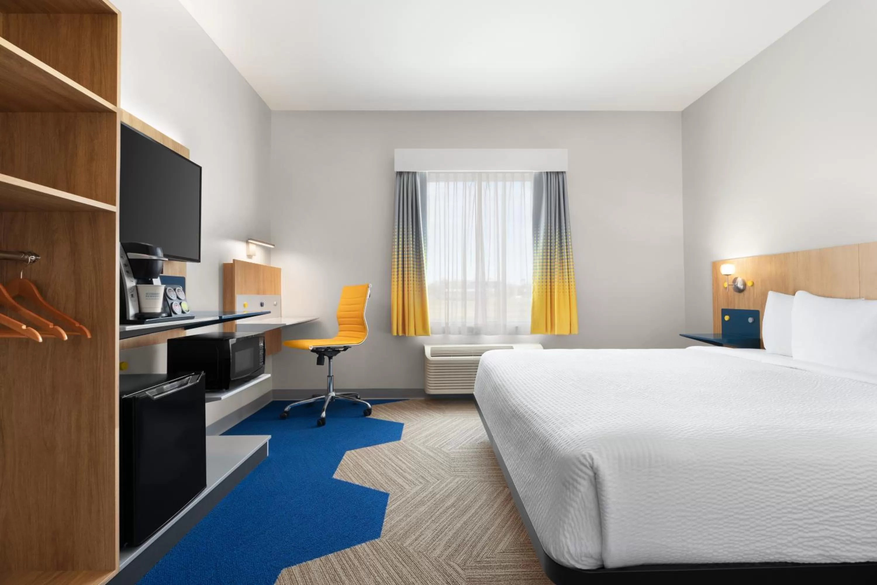 Bed in Microtel Inn & Suites by Wyndham Lachute