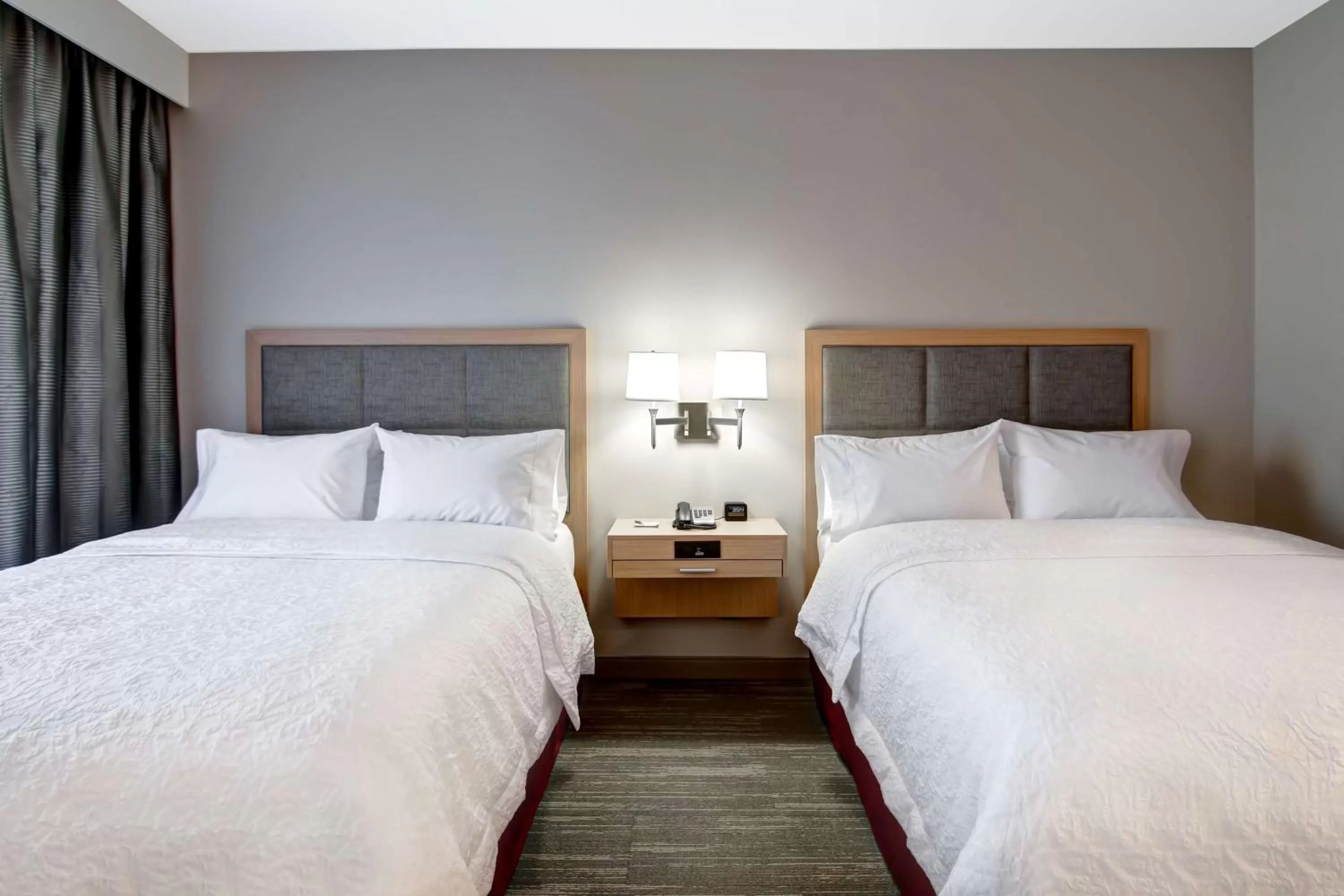 Bed in Hampton Inn & Suites by Hilton Grande Prairie