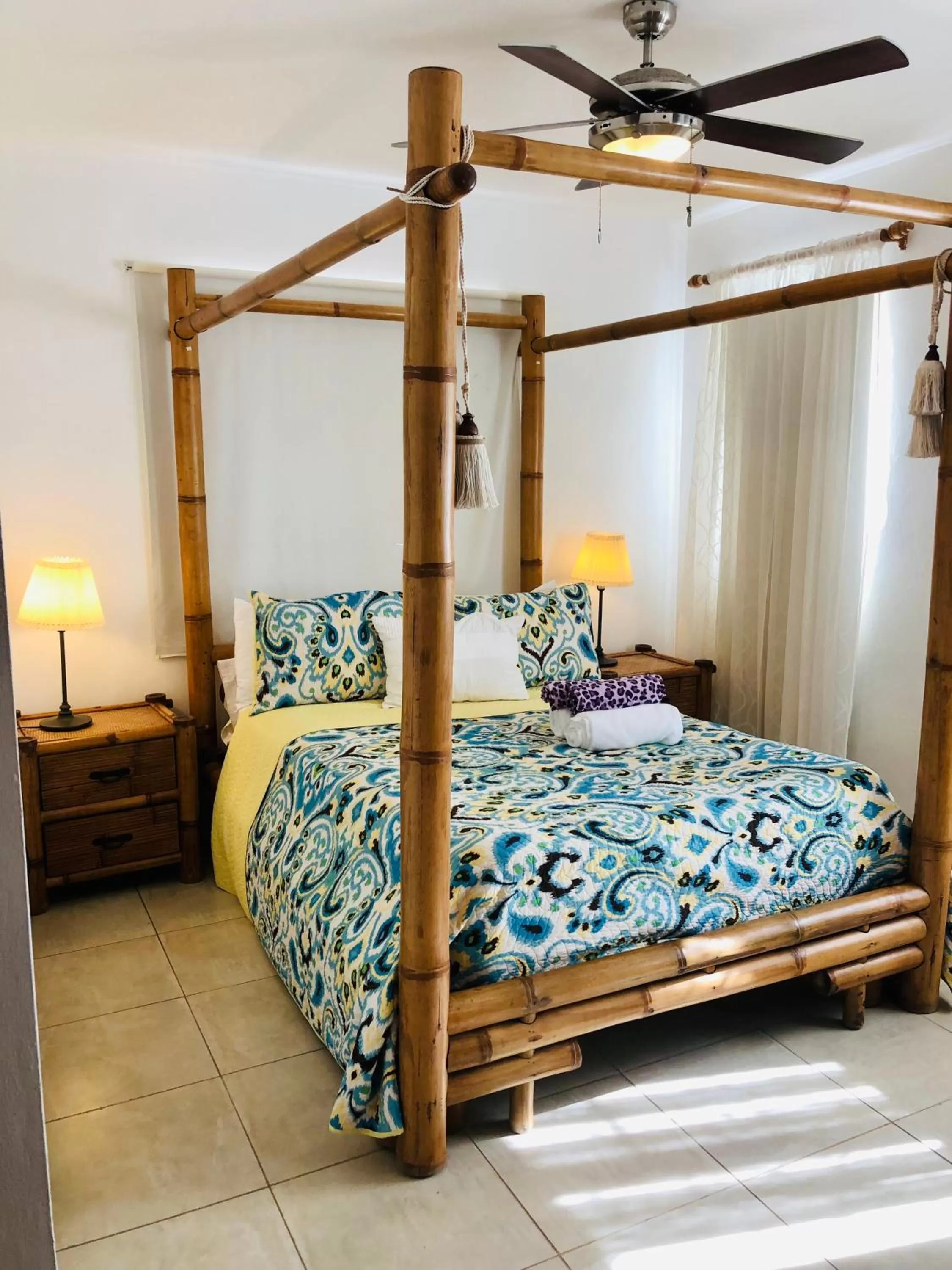 Bed in Los Corales Luxury Villas Beach Club and Spa