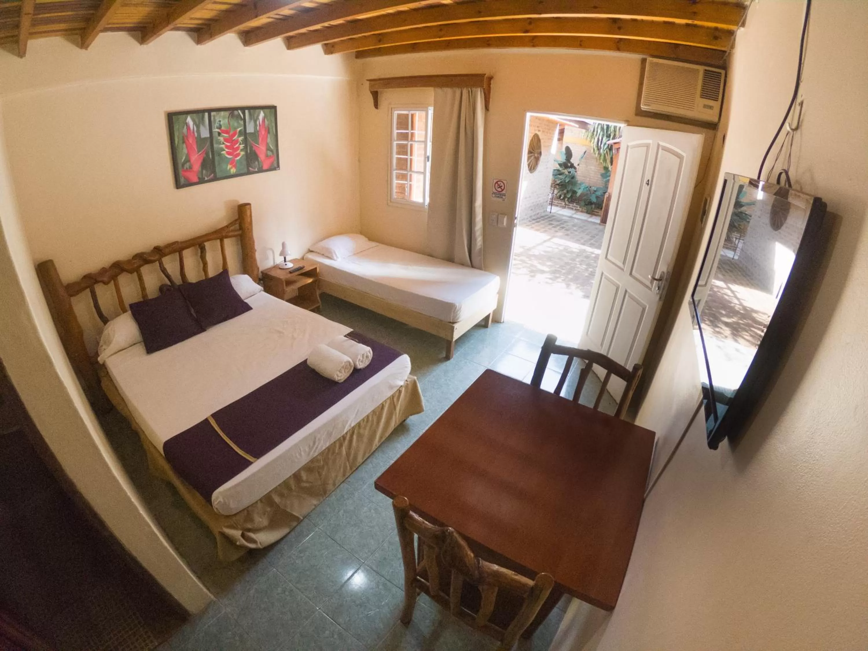 Bedroom in Posada Los Tajibos
