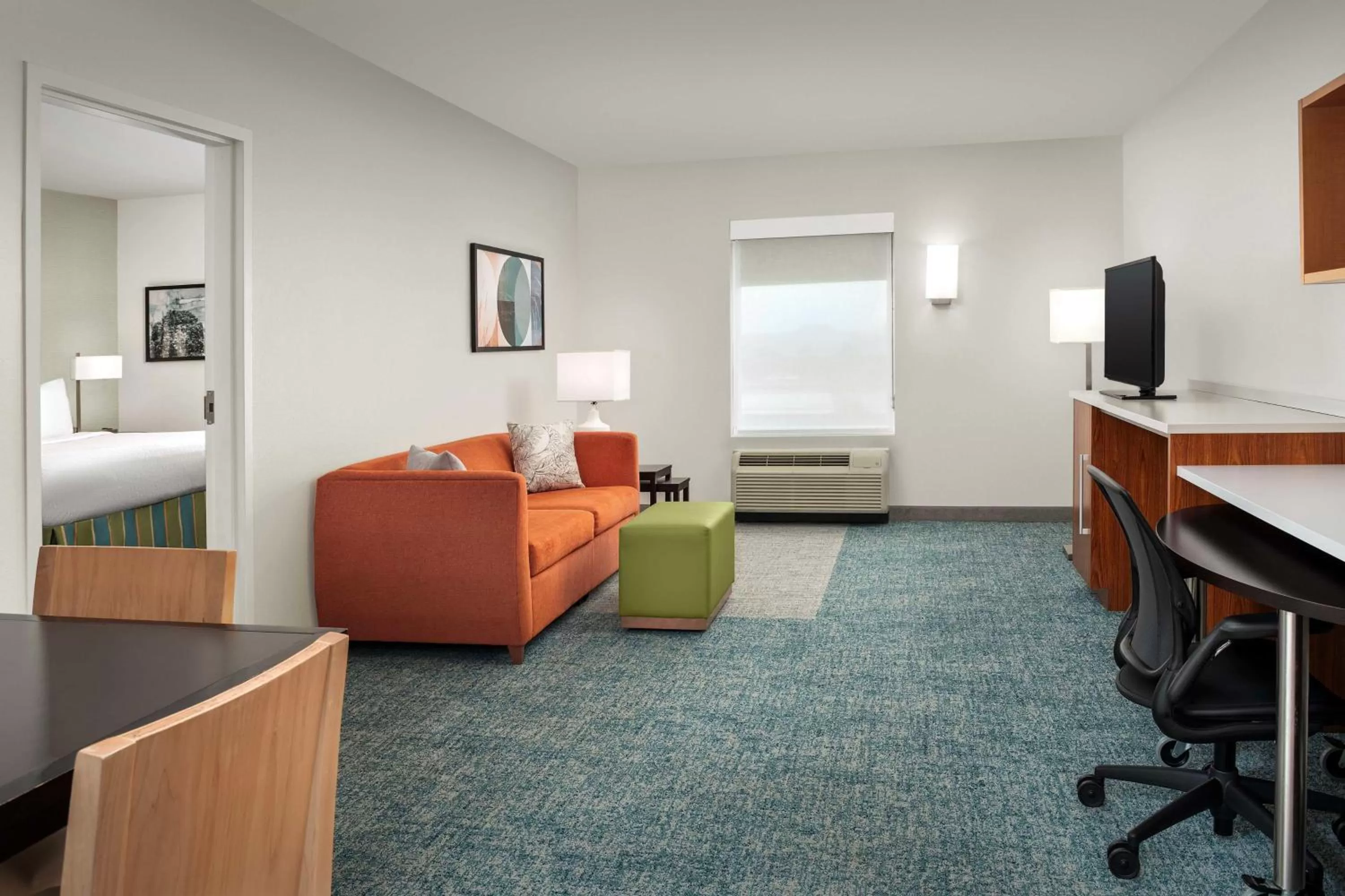 Living room, Bed in Home2 Suites by Hilton Austin Round Rock