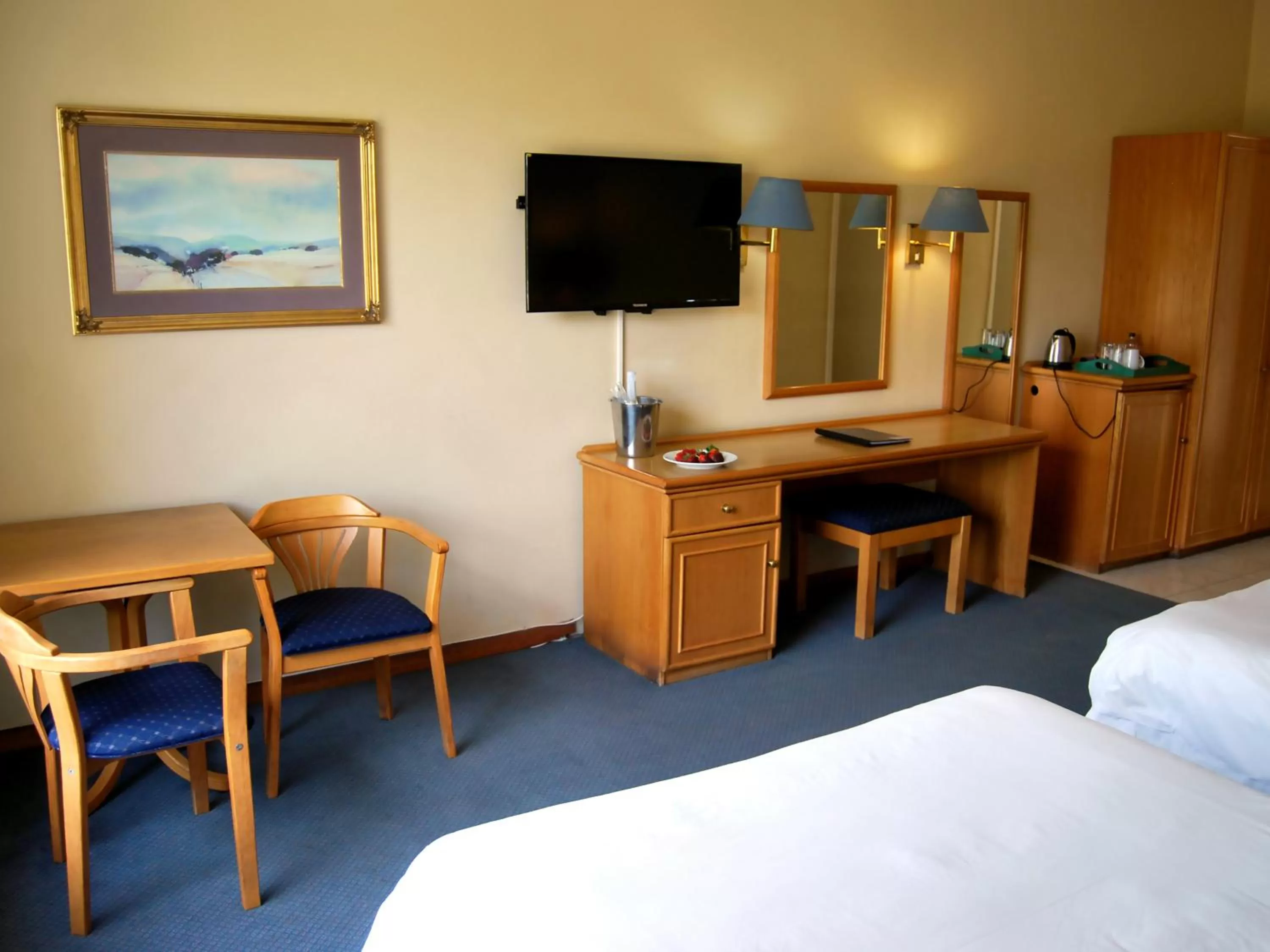 Bed in Safari Hotel & Convention Centre