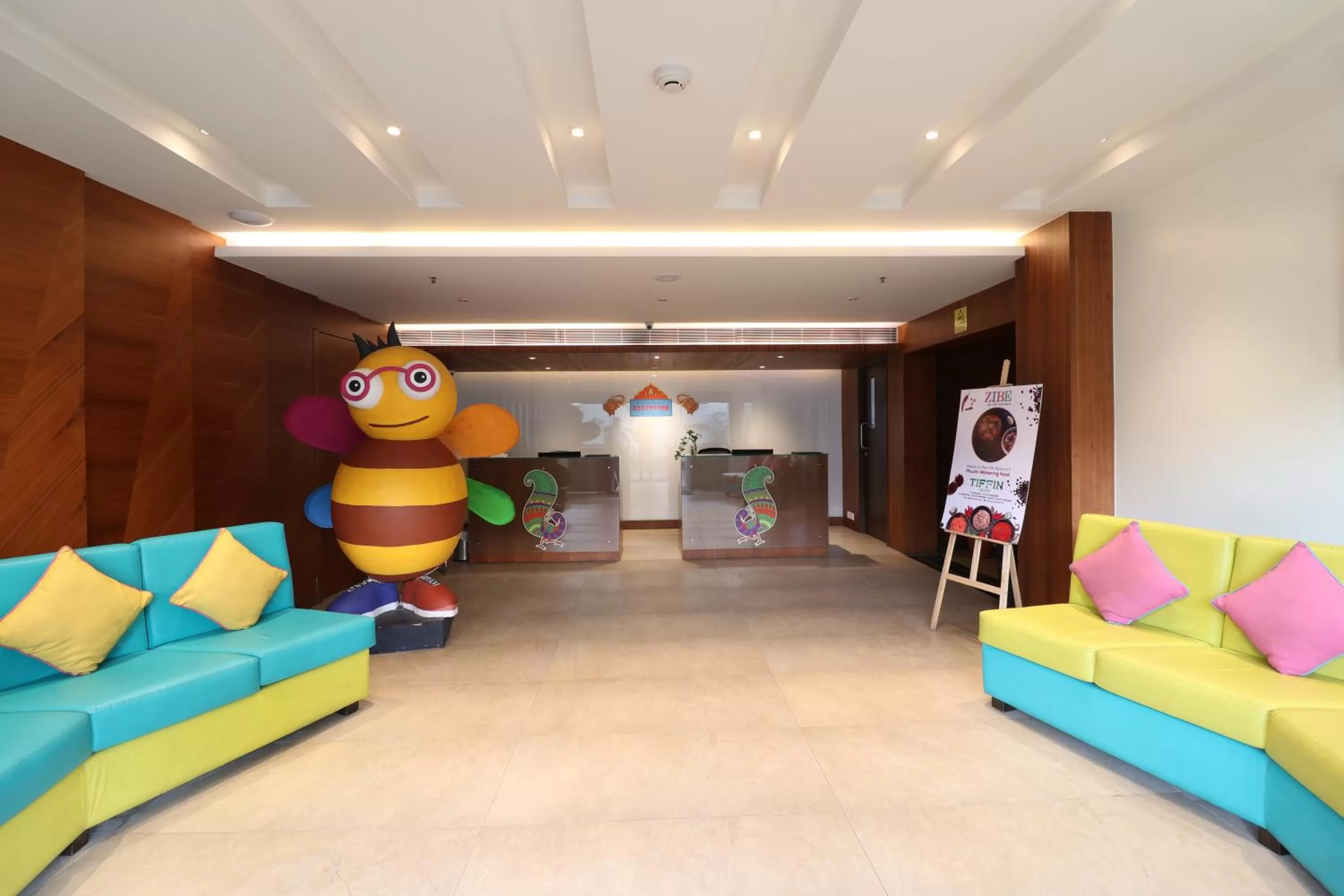 Communal lounge/ TV room in ZIBE Salem By GRT Hotels