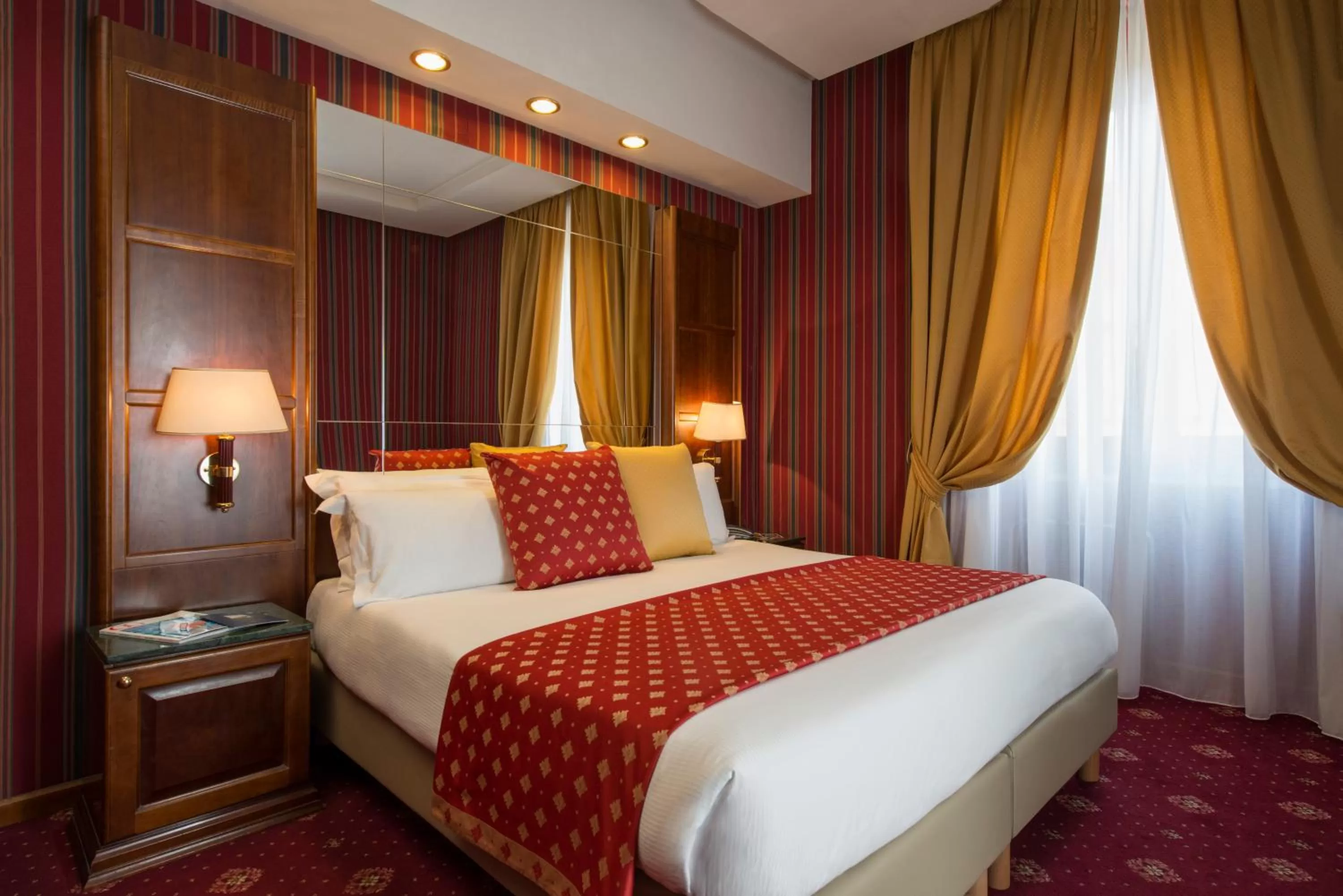 Bed in Atlante Garden Hotel