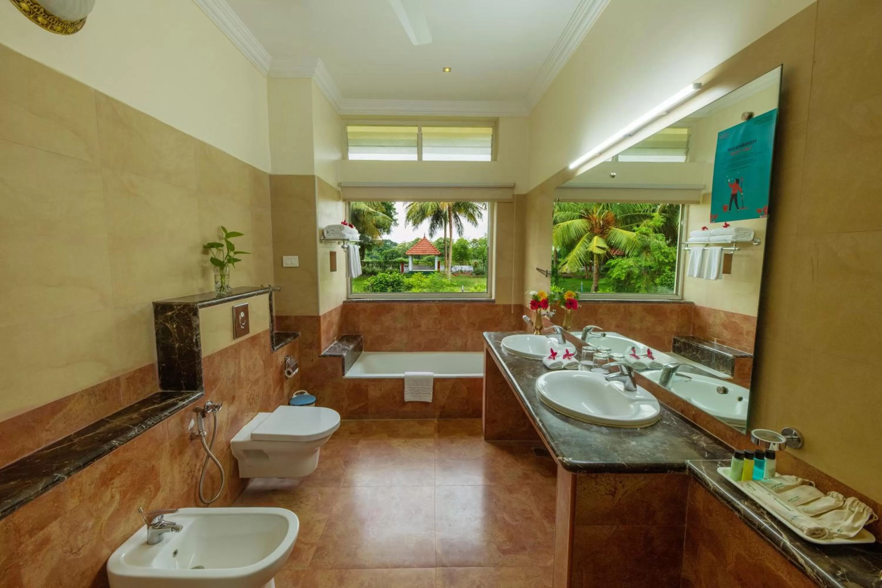 Bathroom in GReaT Trails Riverview Thanjavur By GRT Hotels
