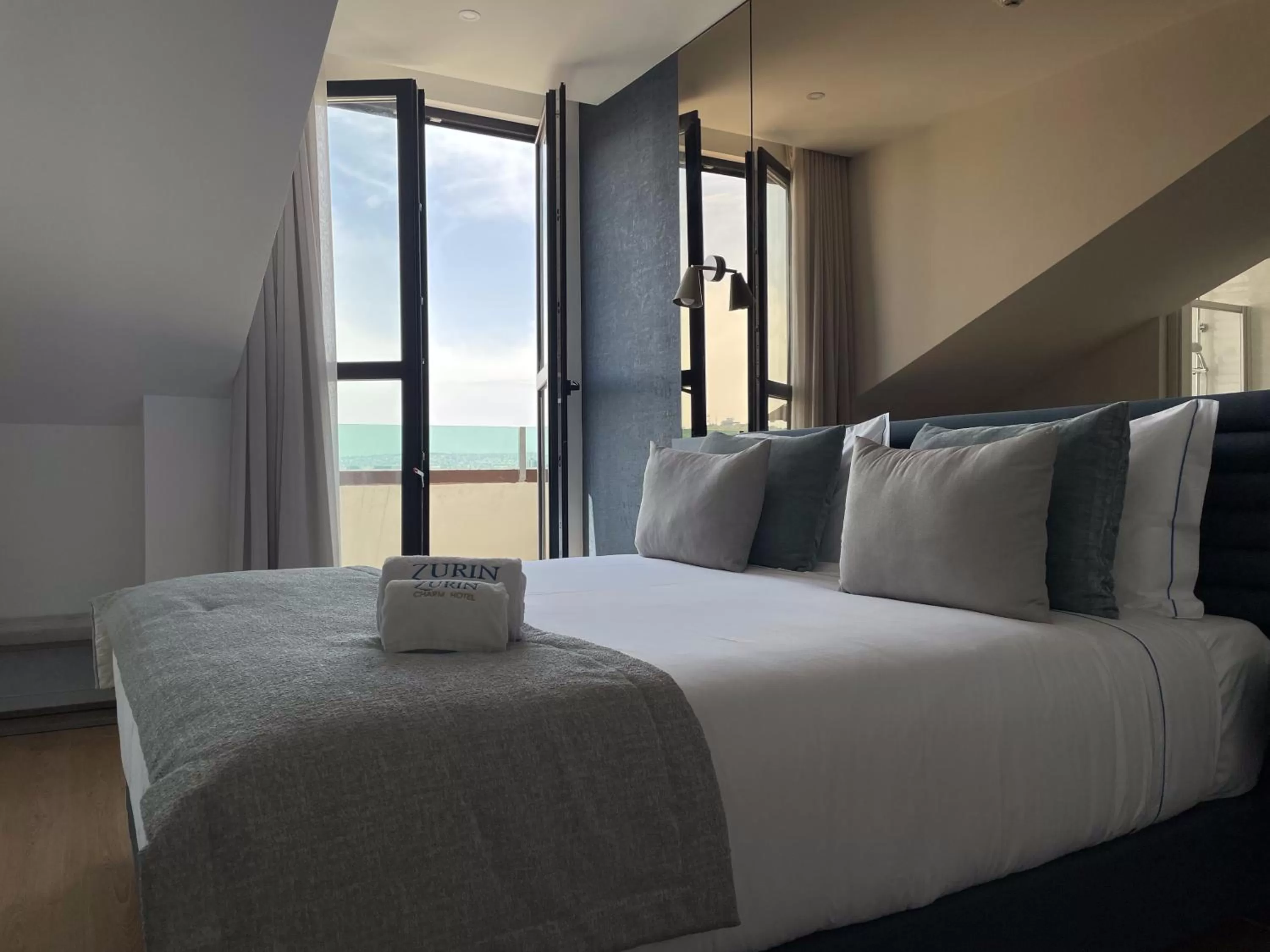 Bed in Zurin Charm Hotel