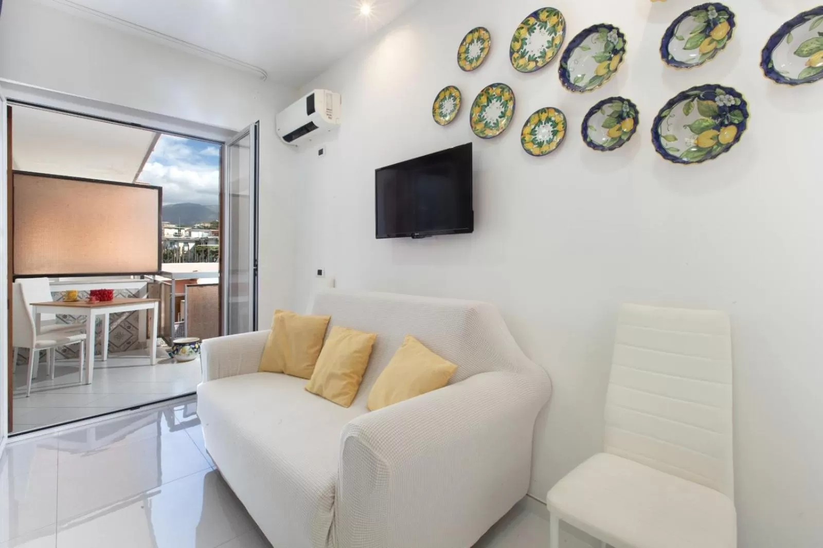 Communal lounge/ TV room, Seating Area in SORRENTO HOME