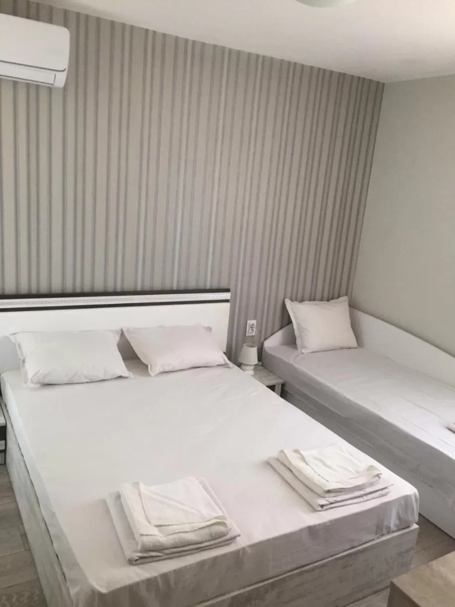 Bed in Family Hotel Malibu