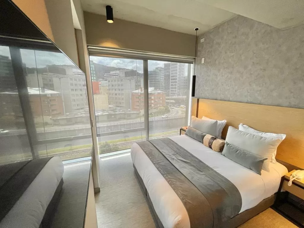 Bedroom, Bed in ICON 100 Luxury Apartasuites