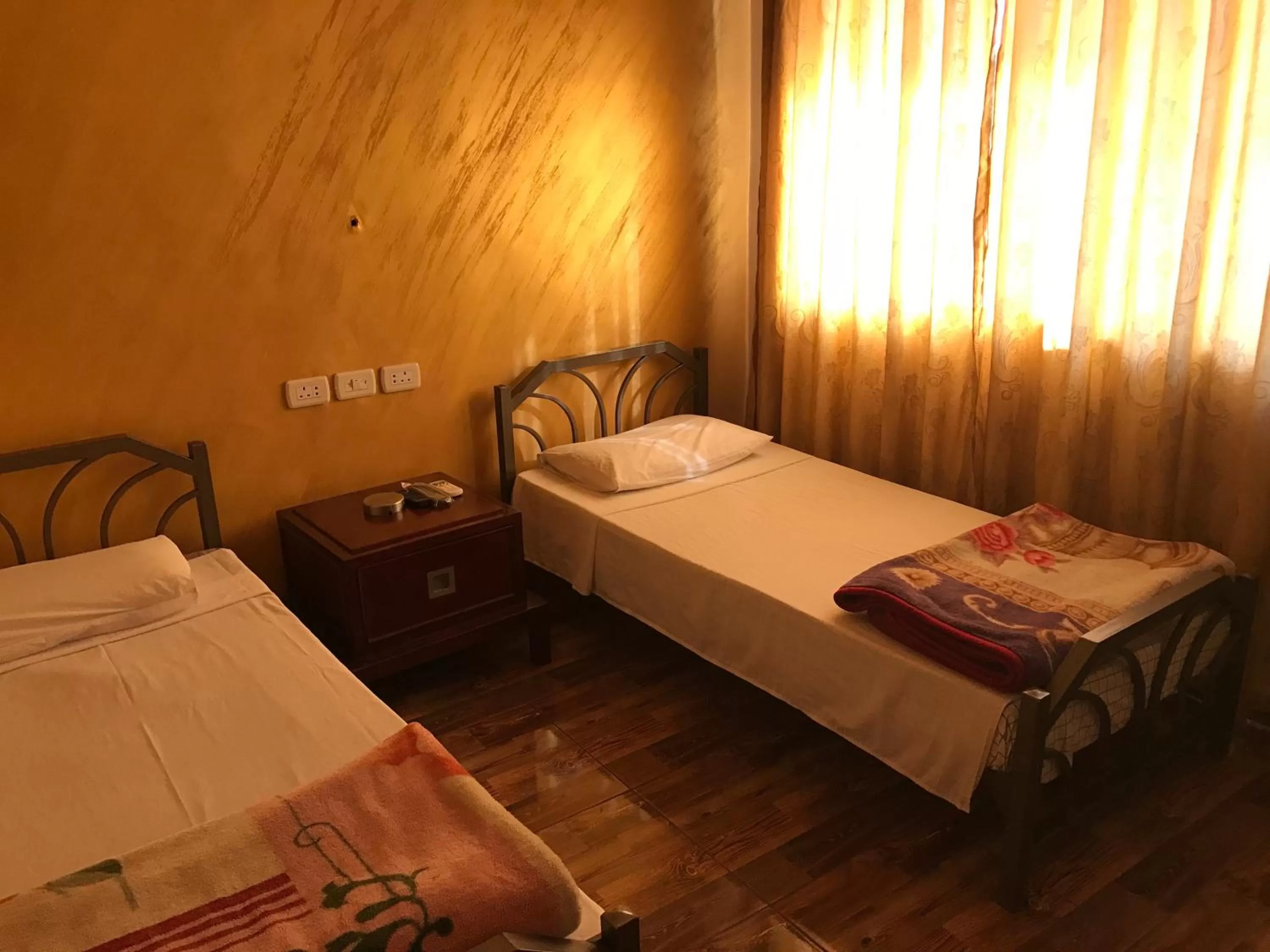 Bed in Sun Rise Hotel & Hostel & Tours