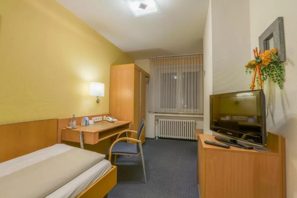 TV and multimedia, Bed in Gästehaus Janzen