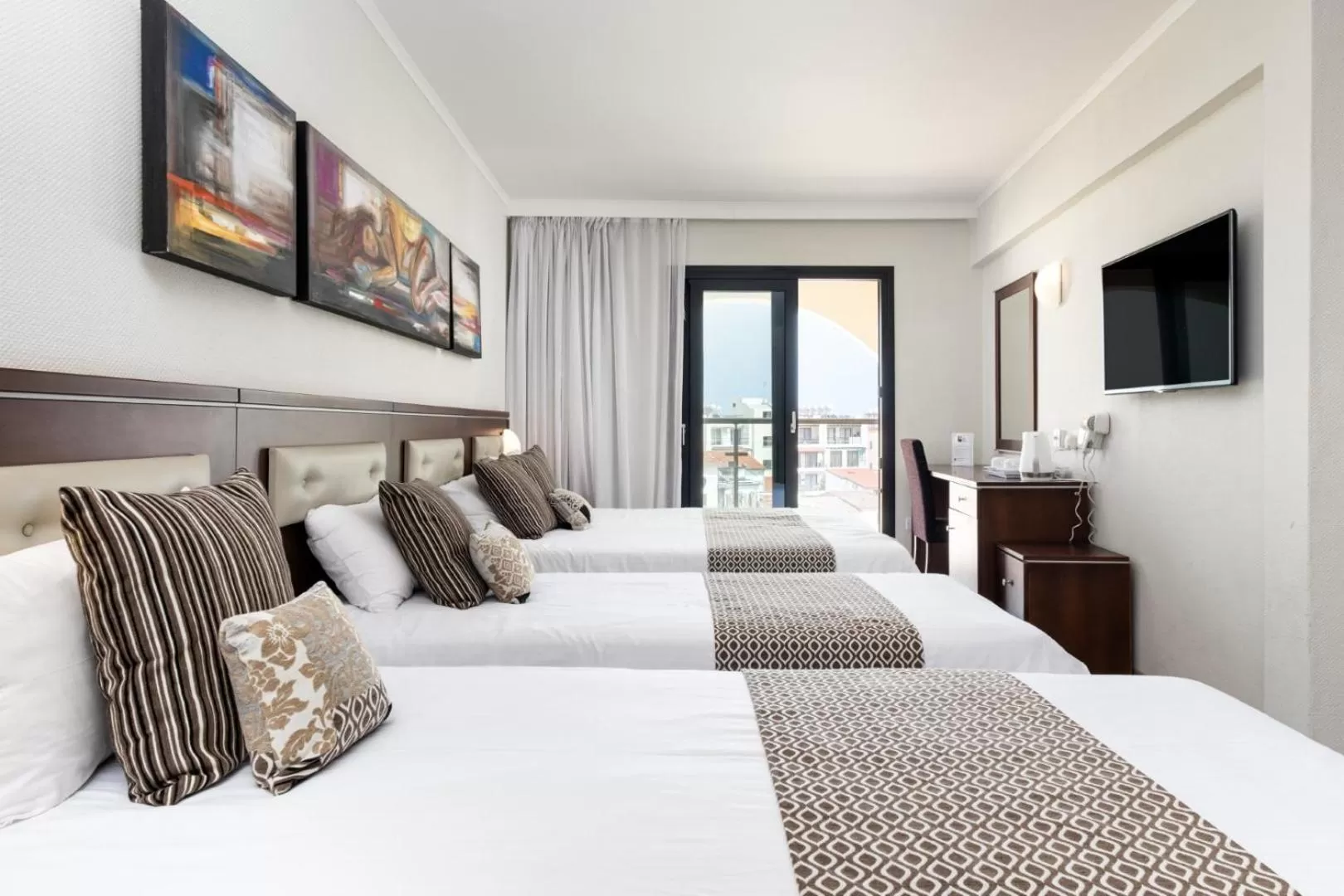 Bed in Livadhiotis City Hotel