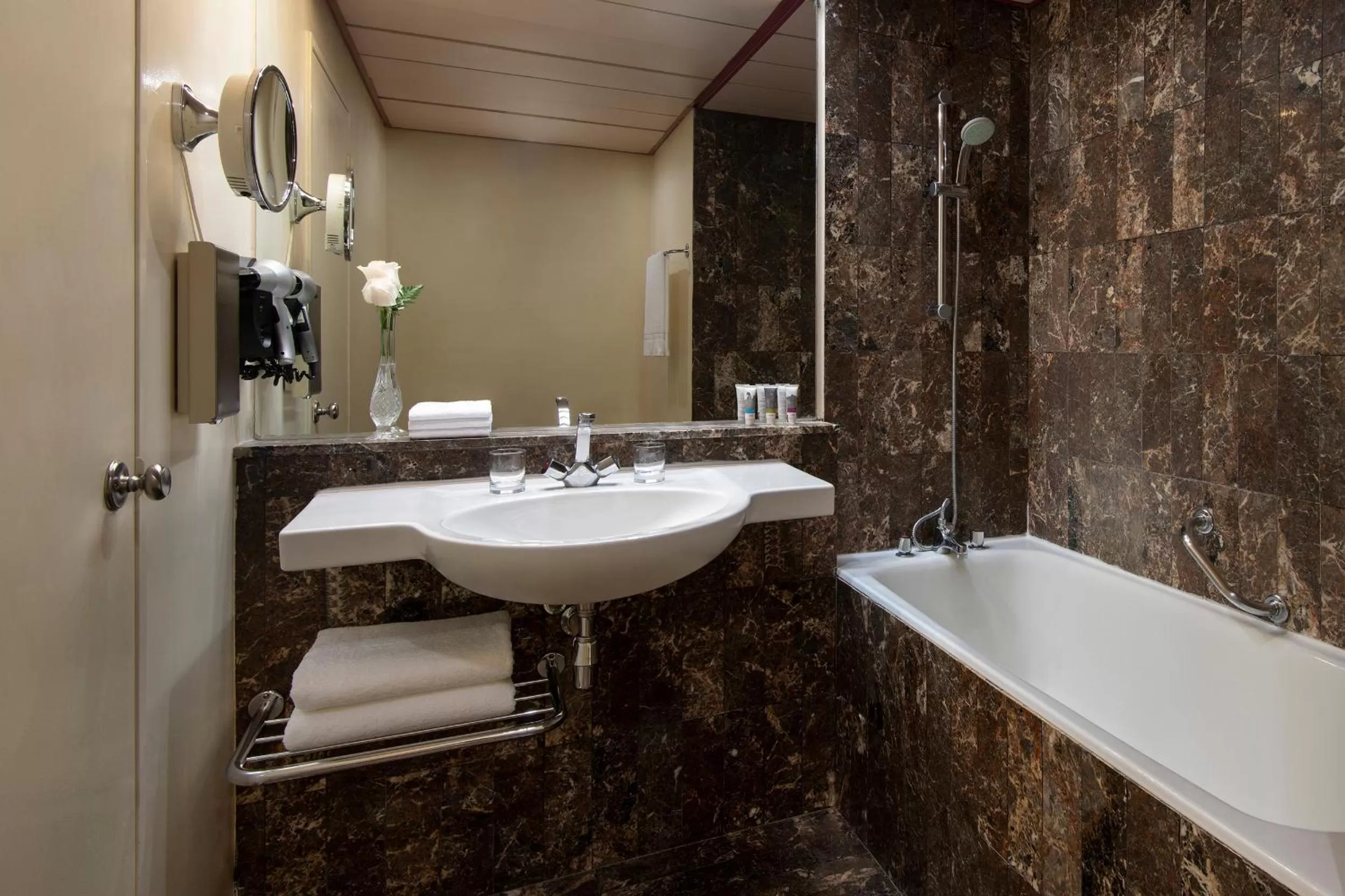 Property building, Bathroom in M Grand Hotel Doha