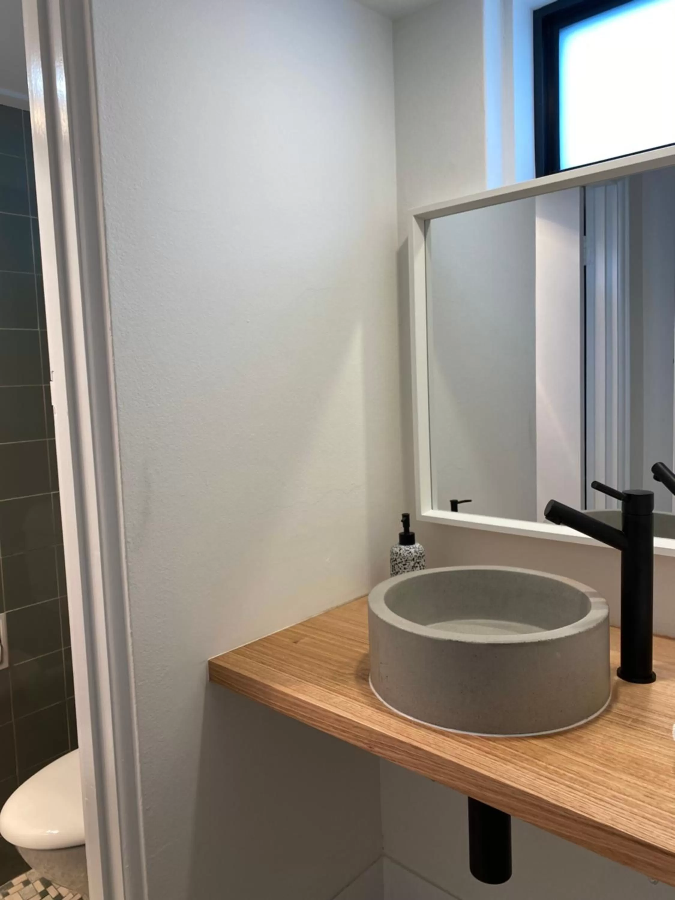 Bathroom in The Astor Hotel Motel